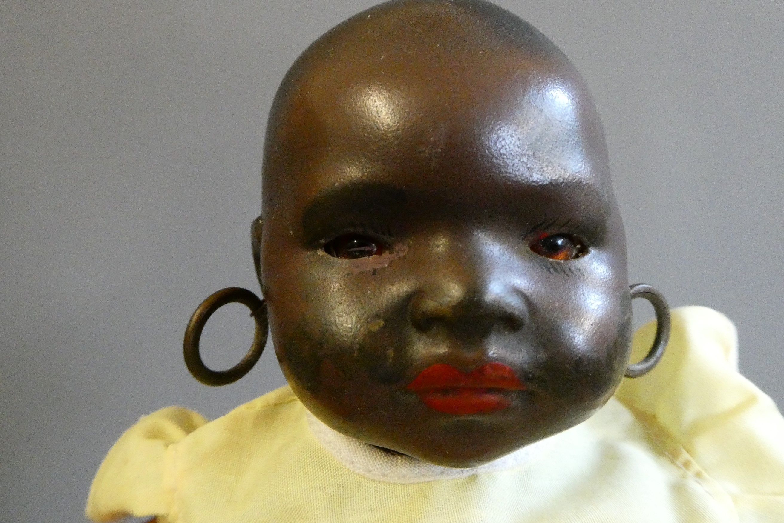 A Heubach Koppelsdorf bisque socket head doll, with brown glass fixed eyes, painted hair, earrings, Image