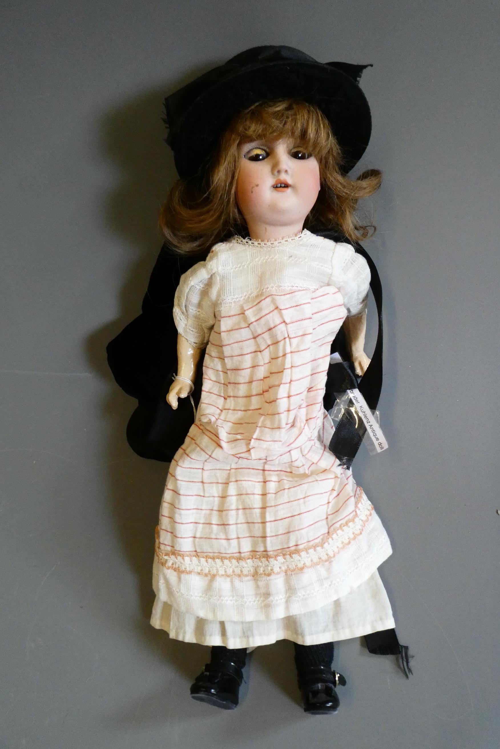 A Gebruder Kuhnlenz bisque socket head doll Image