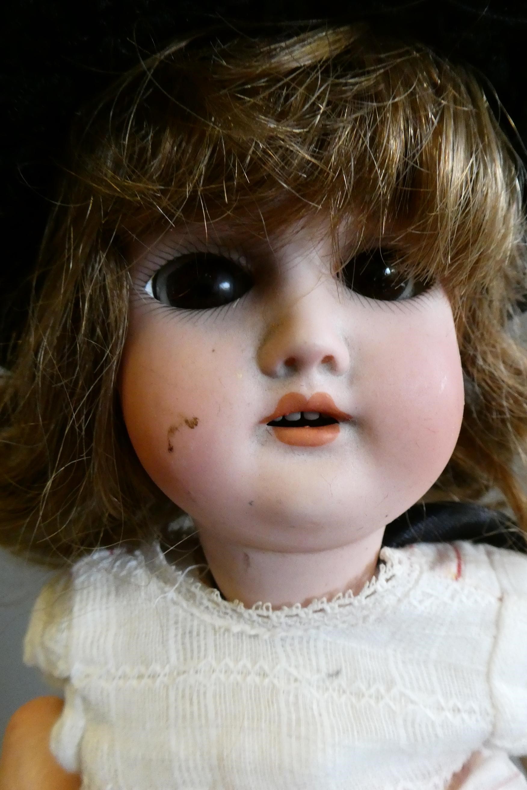 A Gebruder Kuhnlenz bisque socket head doll Image