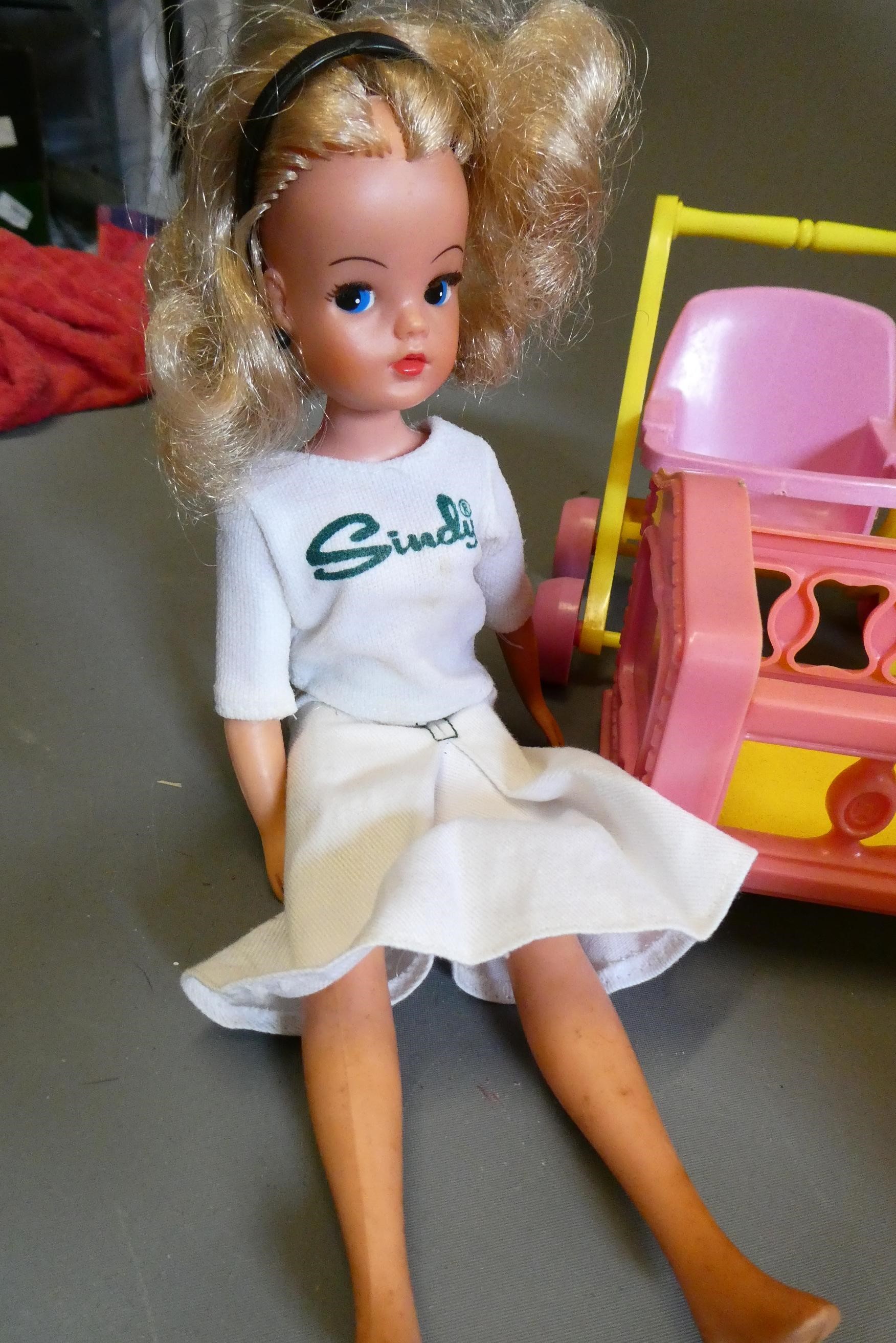 A box of Sindy doll items, including two dolls, one boxed shower, one boxed hair dryer, a horse and Image