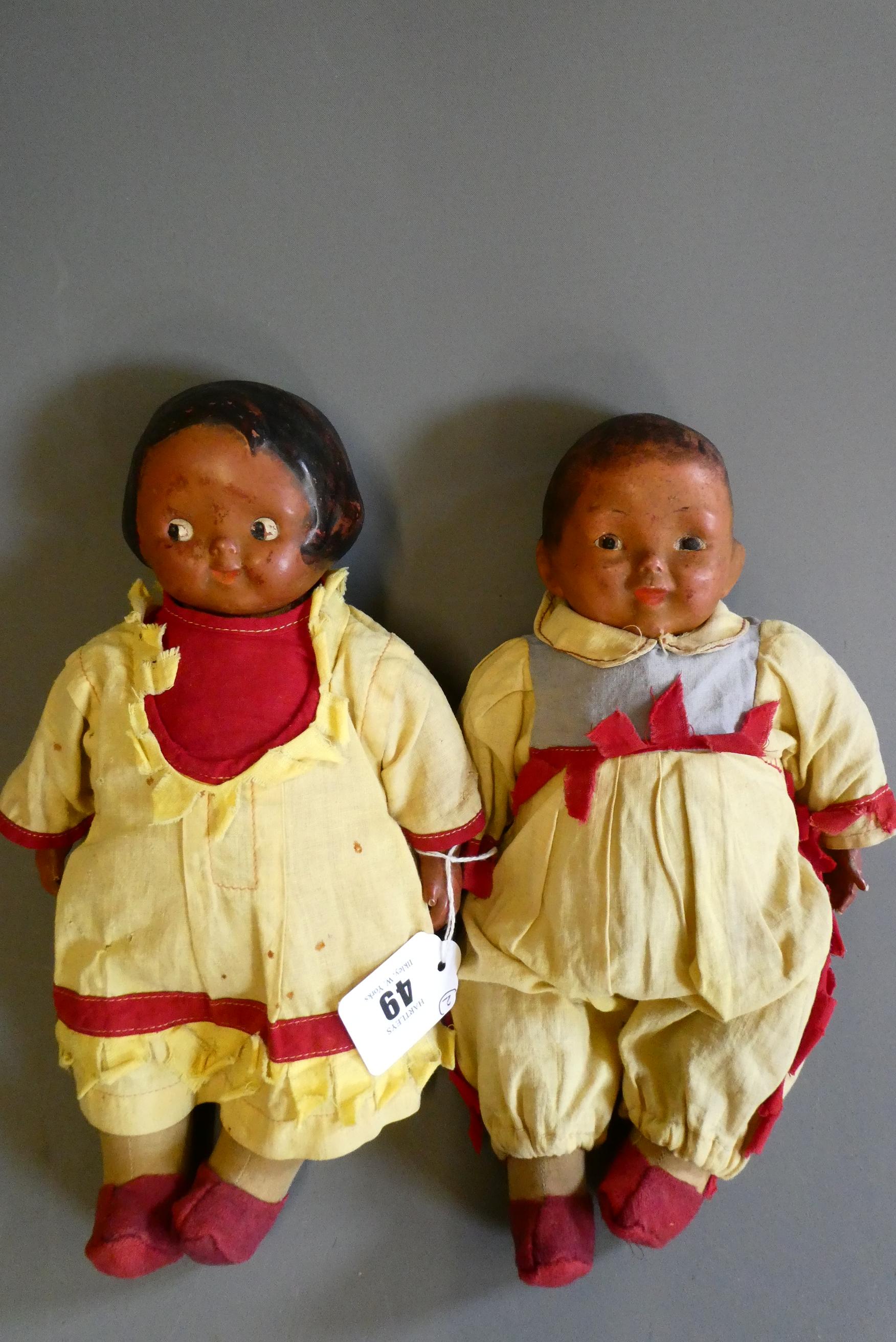 Two vintage composition head dolls, comprising a 1920s horseman and a Campbell Kids Pocahontas, both Image