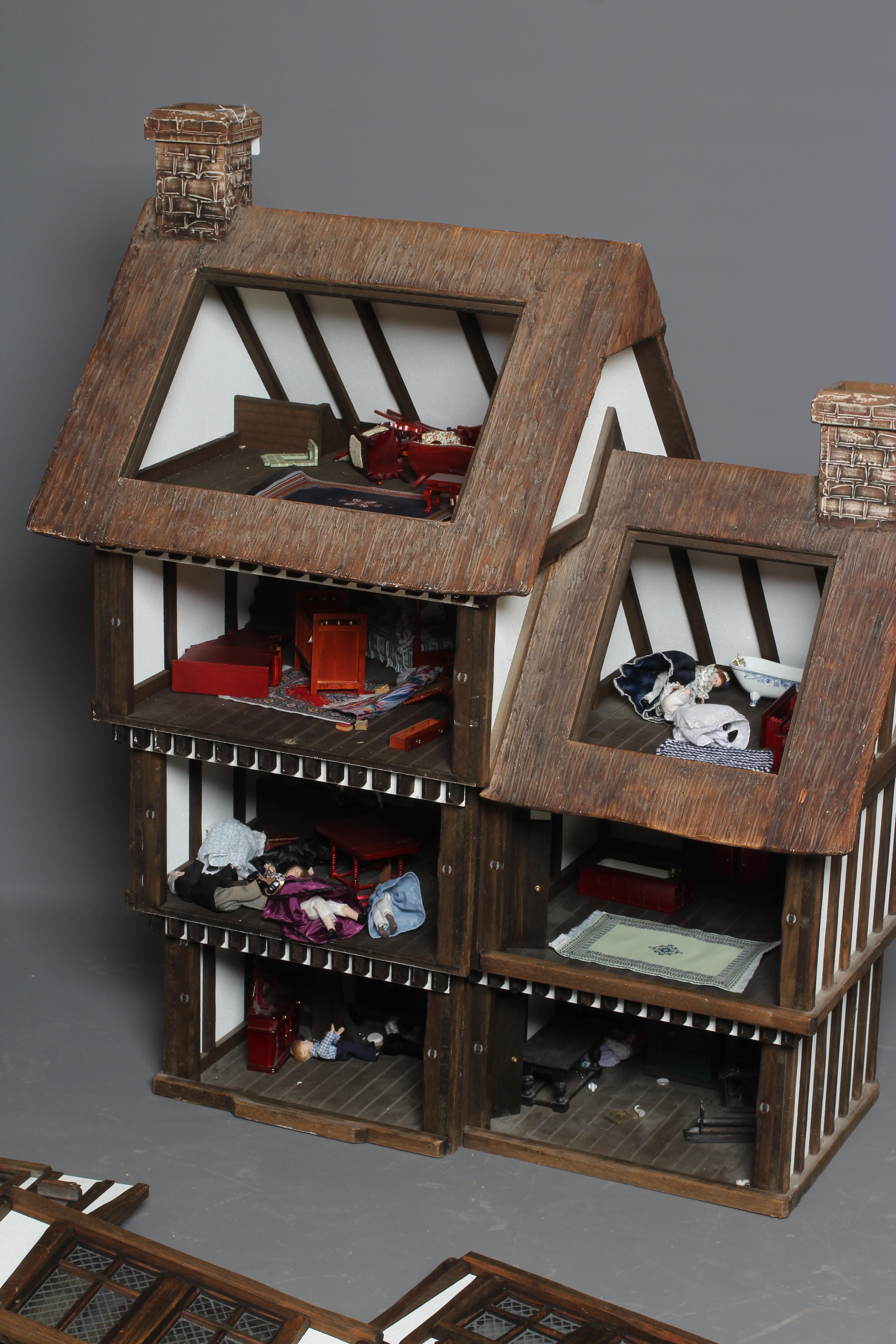 A large Tudor style doll's house Image
