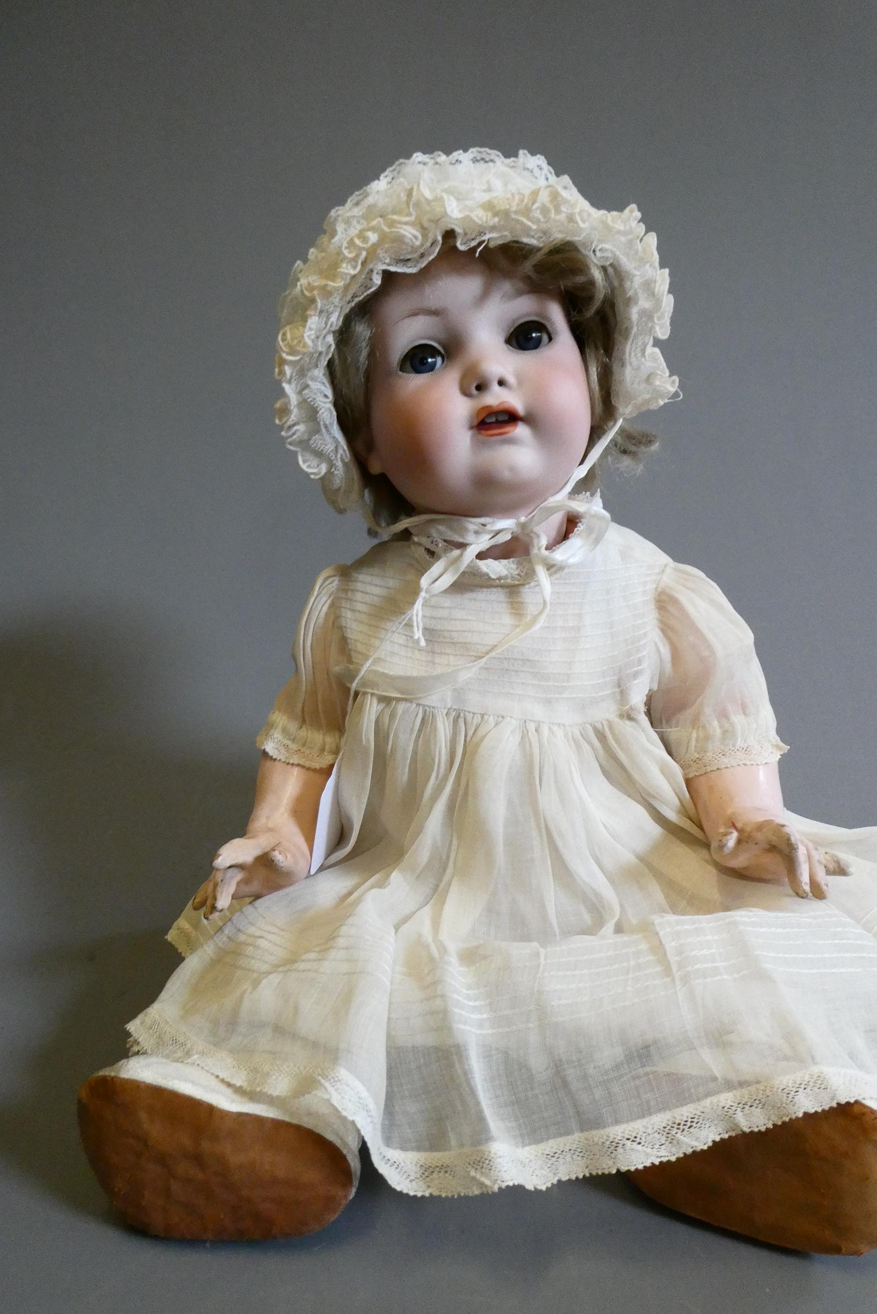 A Melitta bisque socket head character doll Image