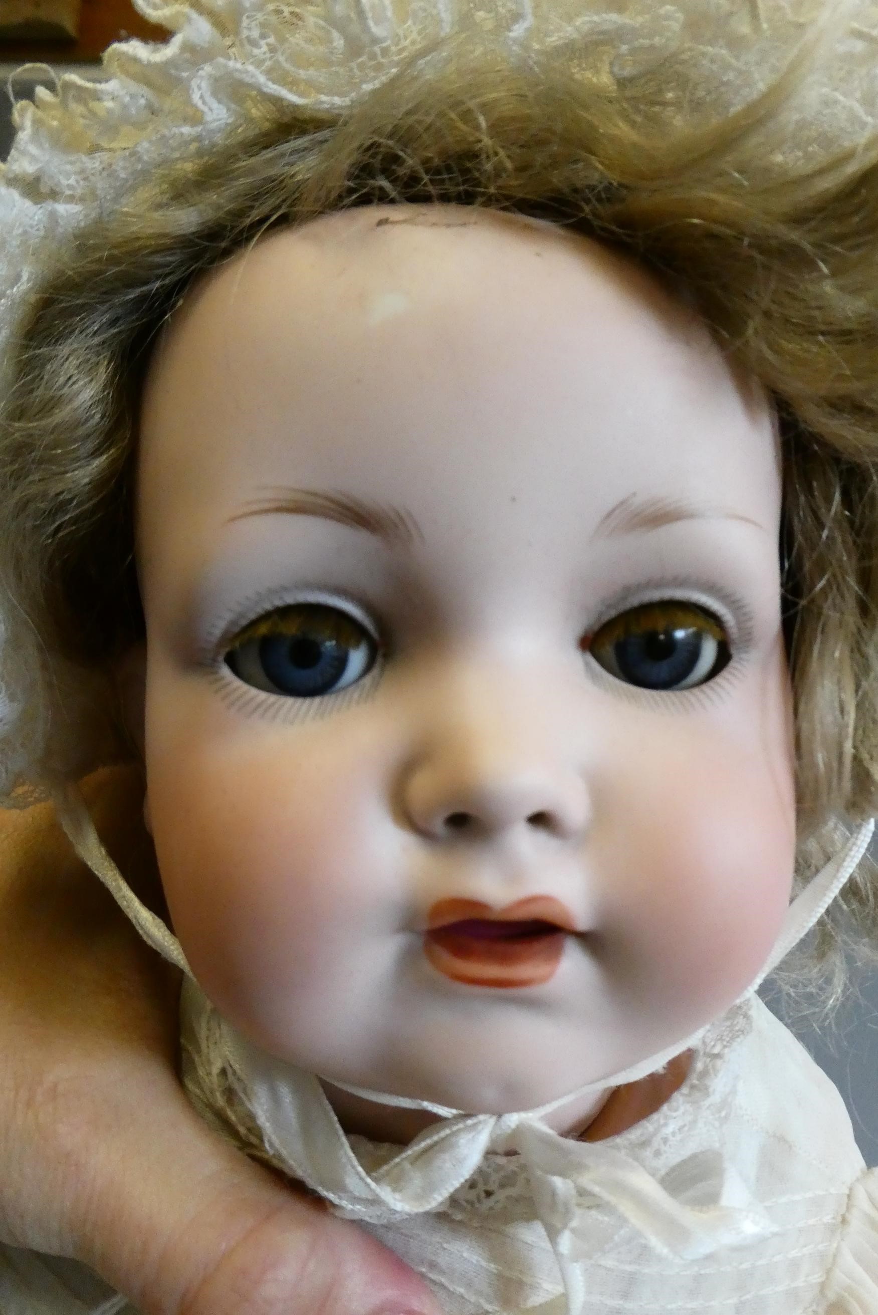 A Melitta bisque socket head character doll Image