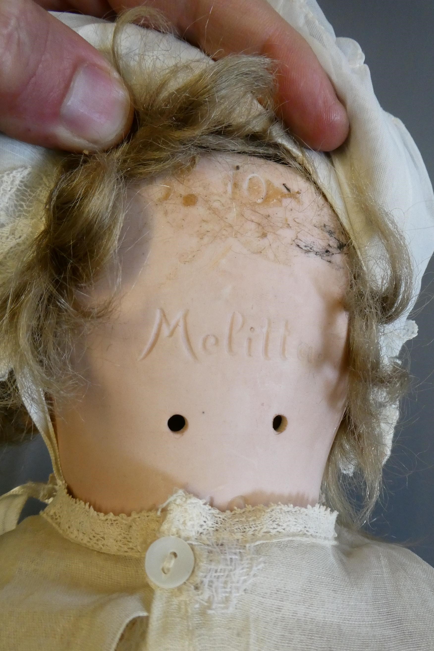 A Melitta bisque socket head character doll Image