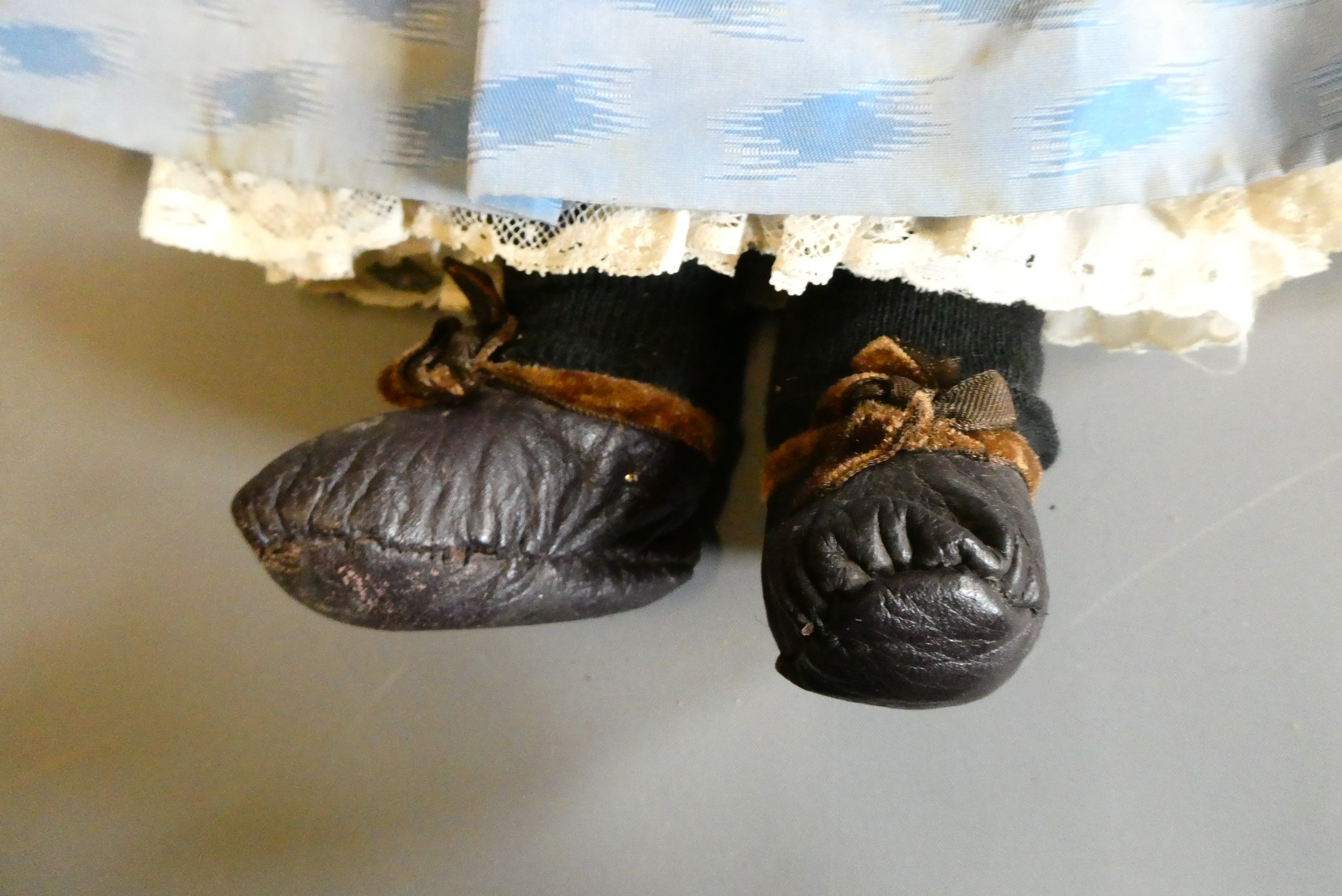 A Victorian bisque shoulder head doll Image