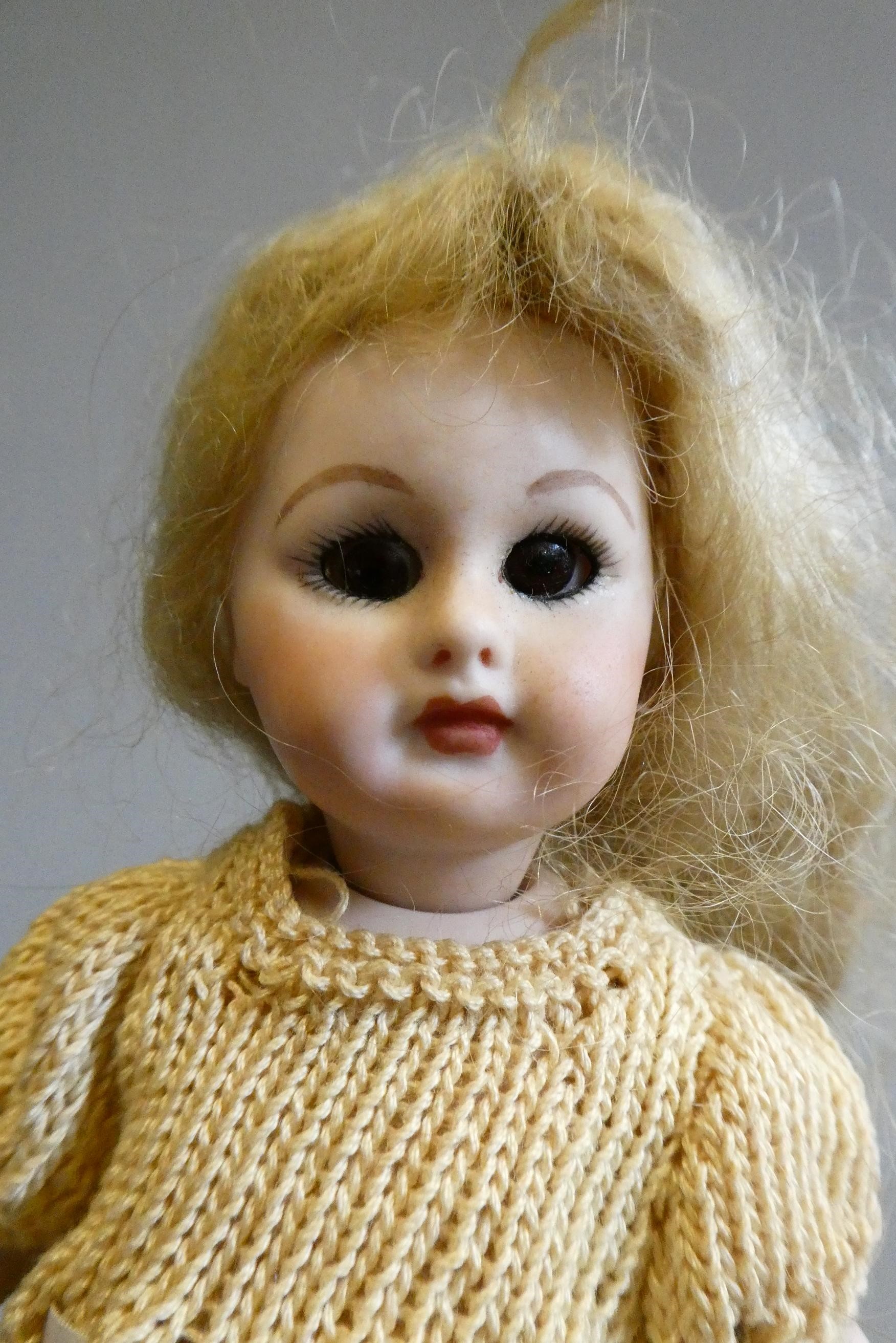 An all bisque socket head doll Image