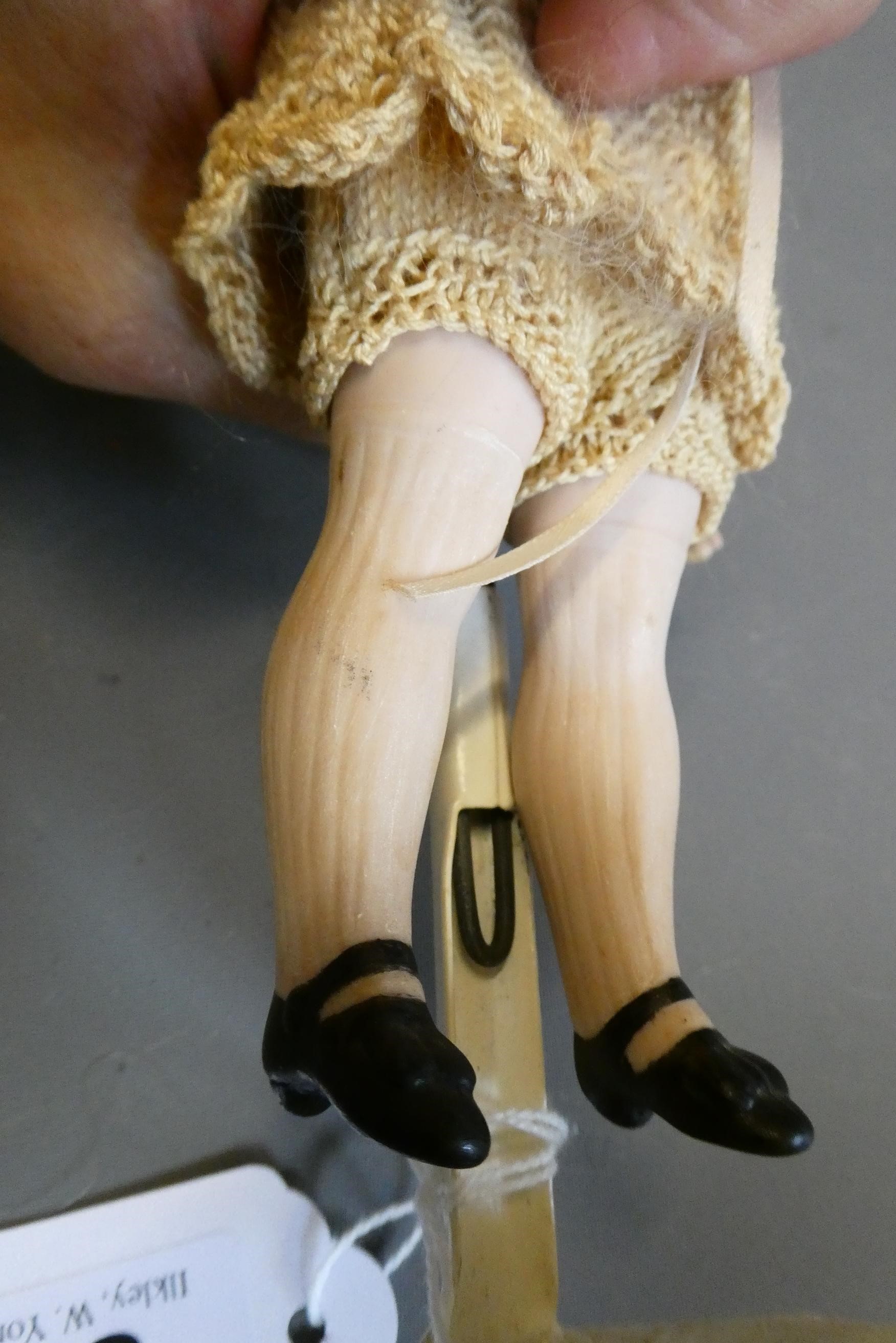 An all bisque socket head doll Image