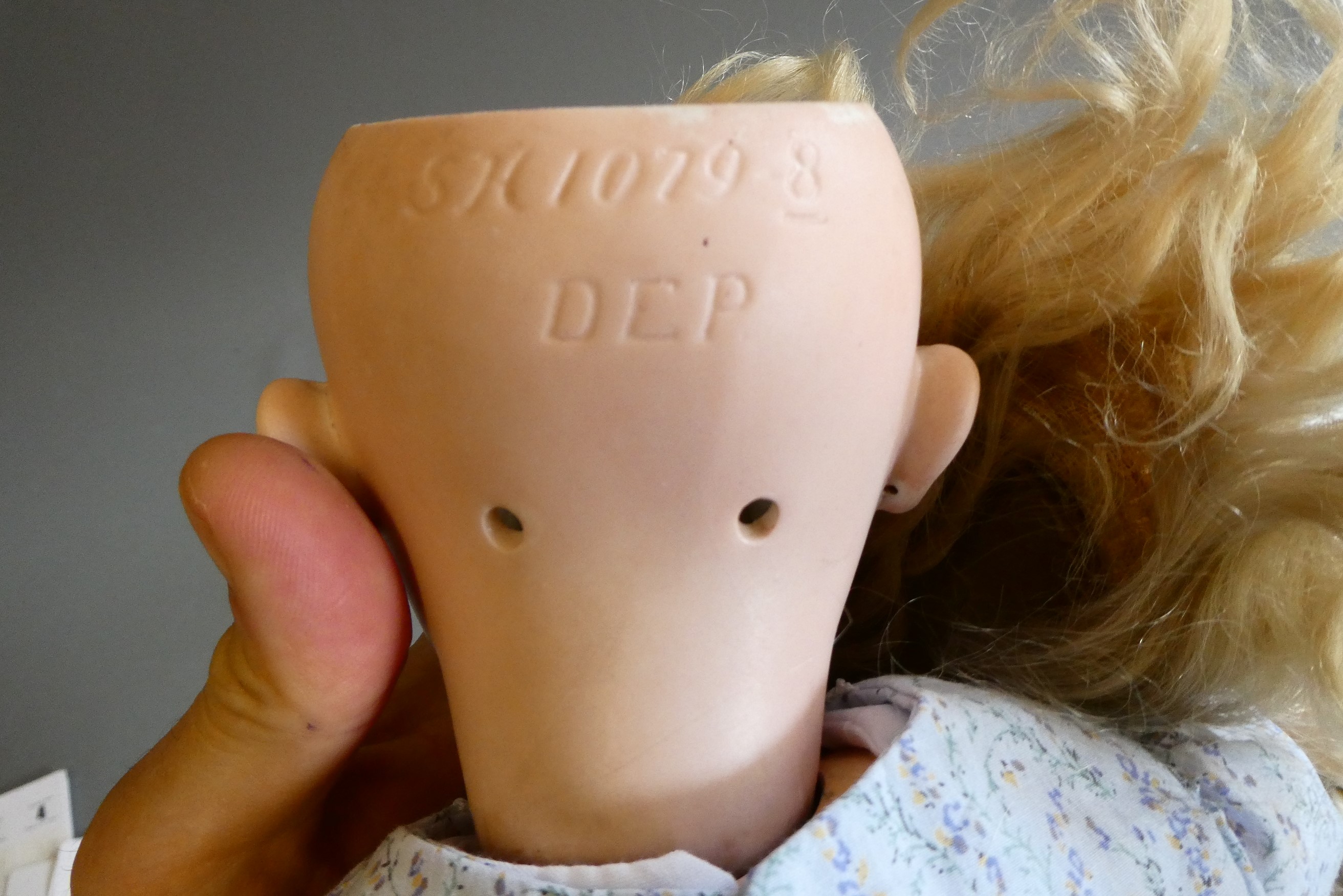 A Simon & Halbig bisque socket head doll Image