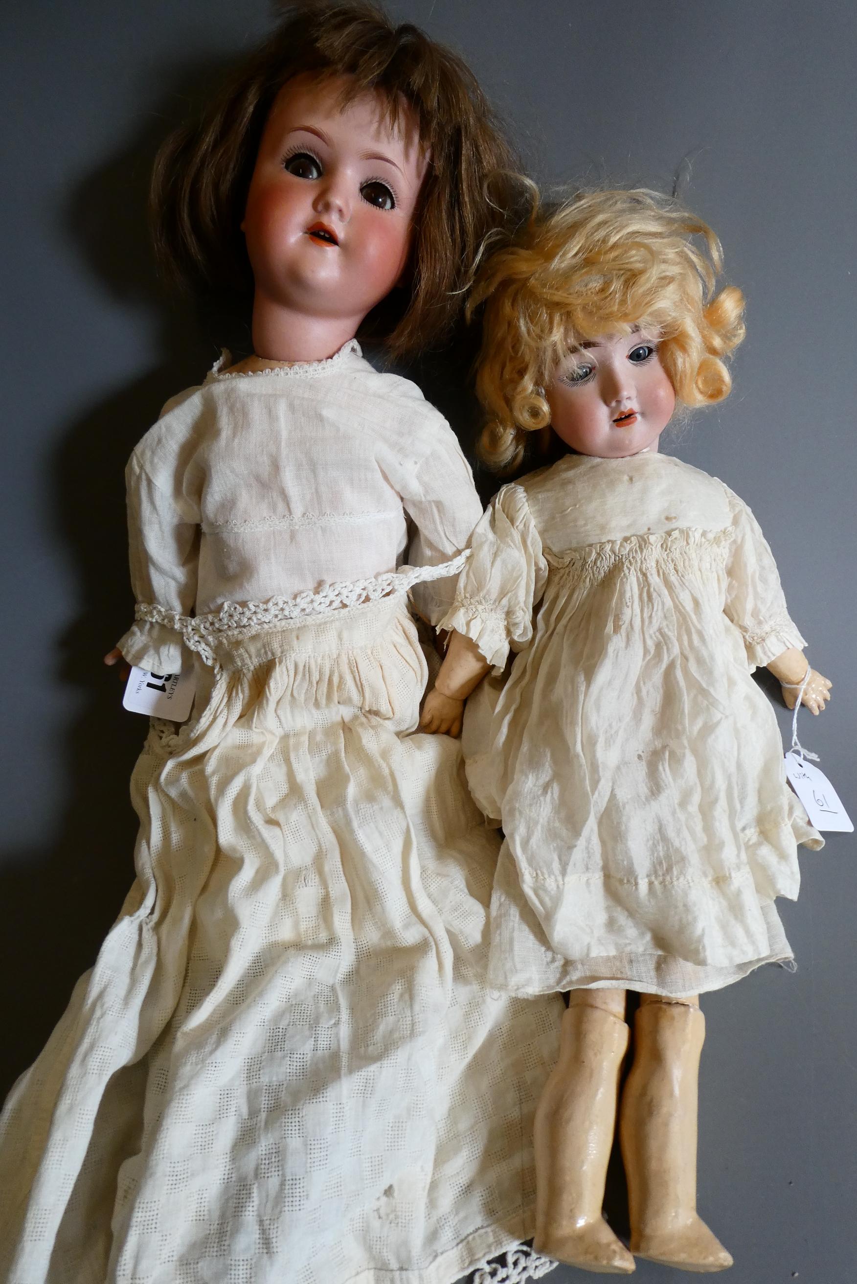 Two German bisque socket head dolls Image