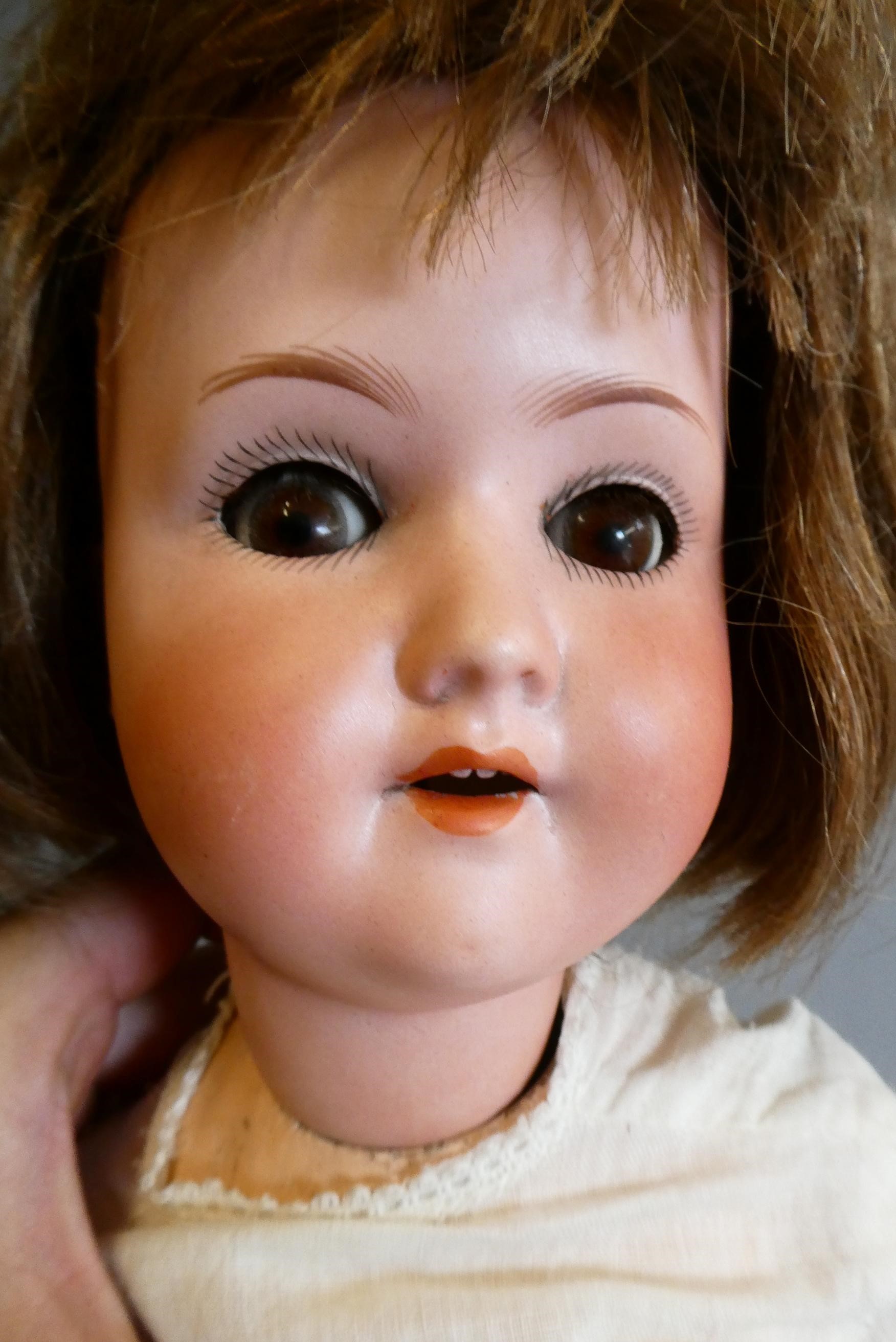 Two German bisque socket head dolls Image