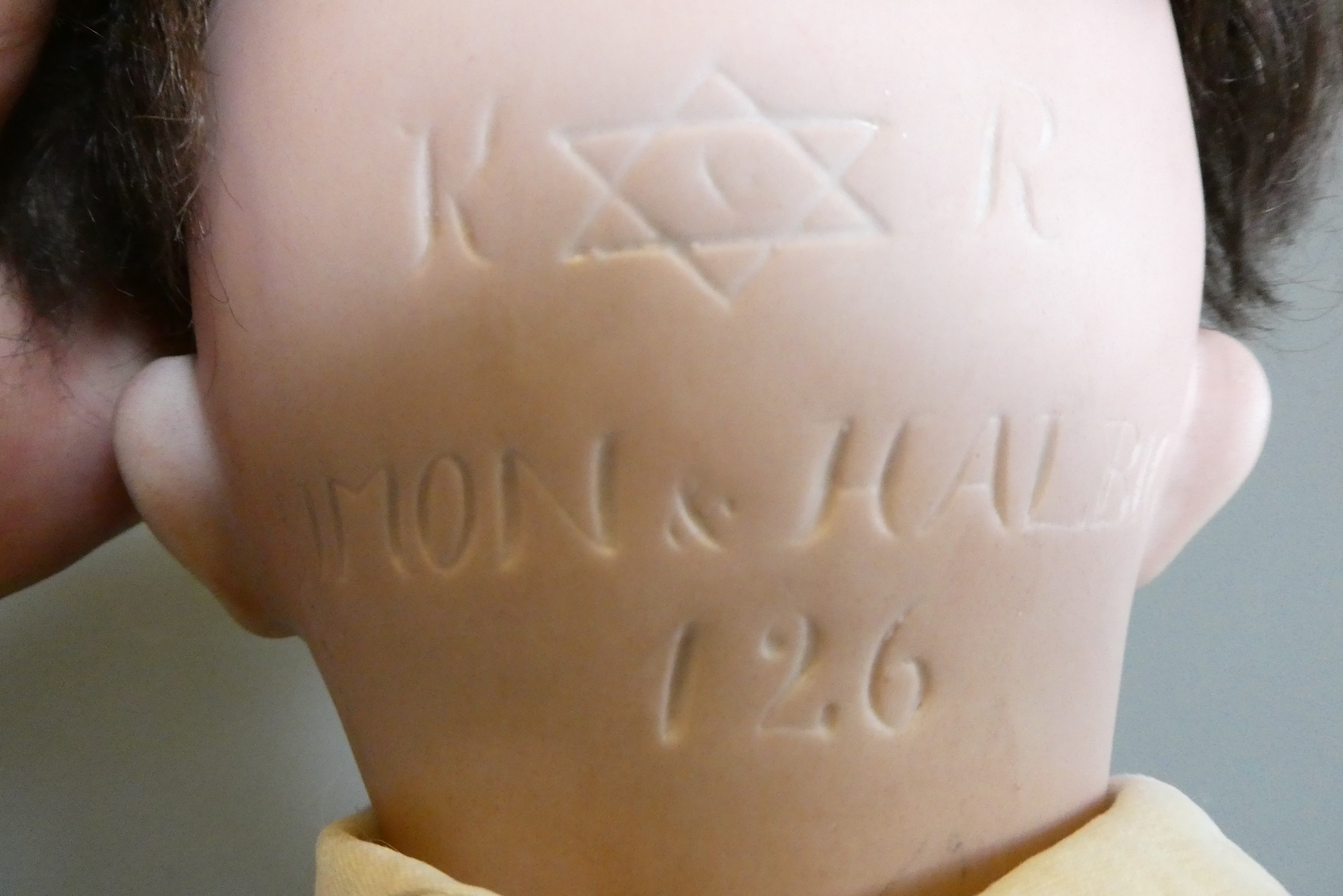 A Simon & Halbig K&R bisque socket head character doll Image