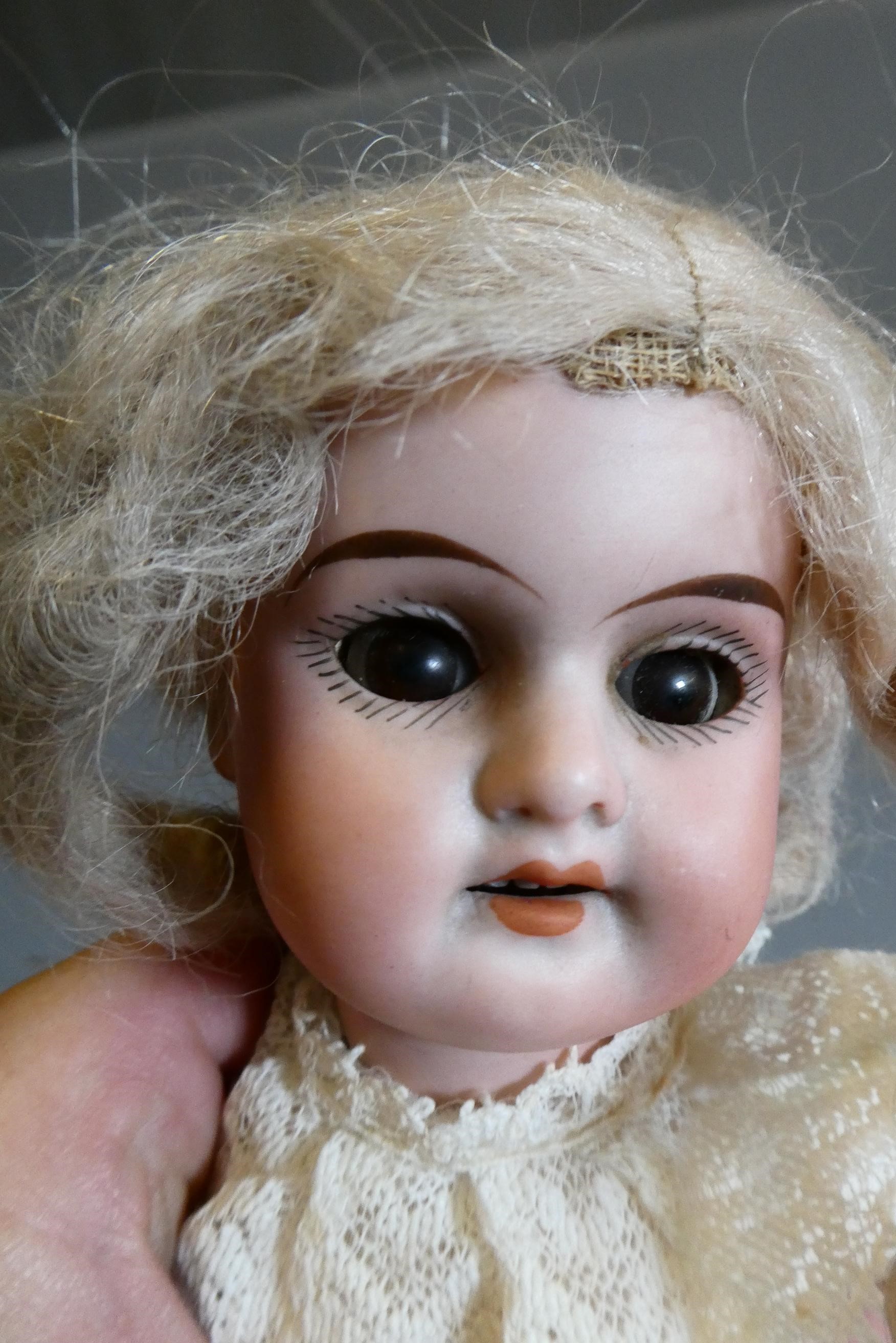 Two German bisque socket head dolls Image