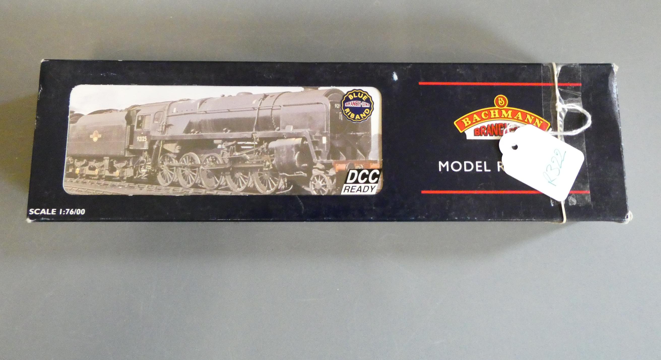 Bachmann Class 9F finished in weathered British Railways black livery with double chimney and BR1F Image
