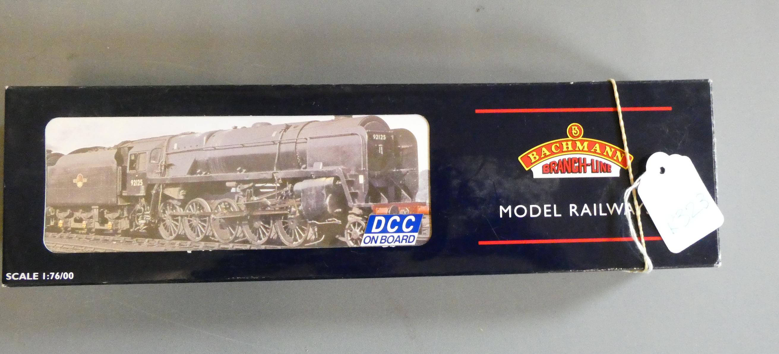 Bachmann Class 9F finished in weathered British Railways black livery with double chimney and BR1F Image