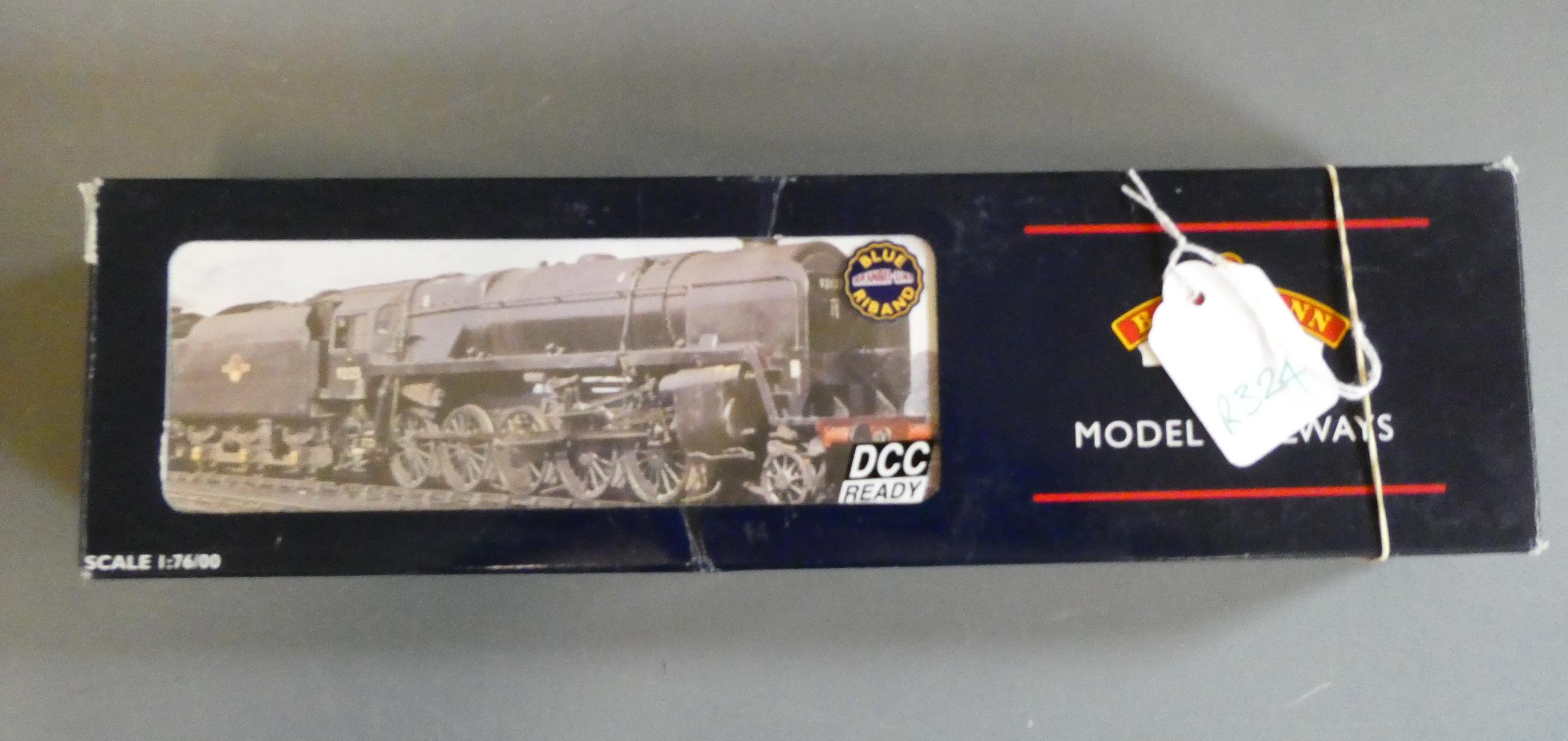 Bachmann Class 9F finished in weathered British Railways black livery with double chimney and BR1F Image
