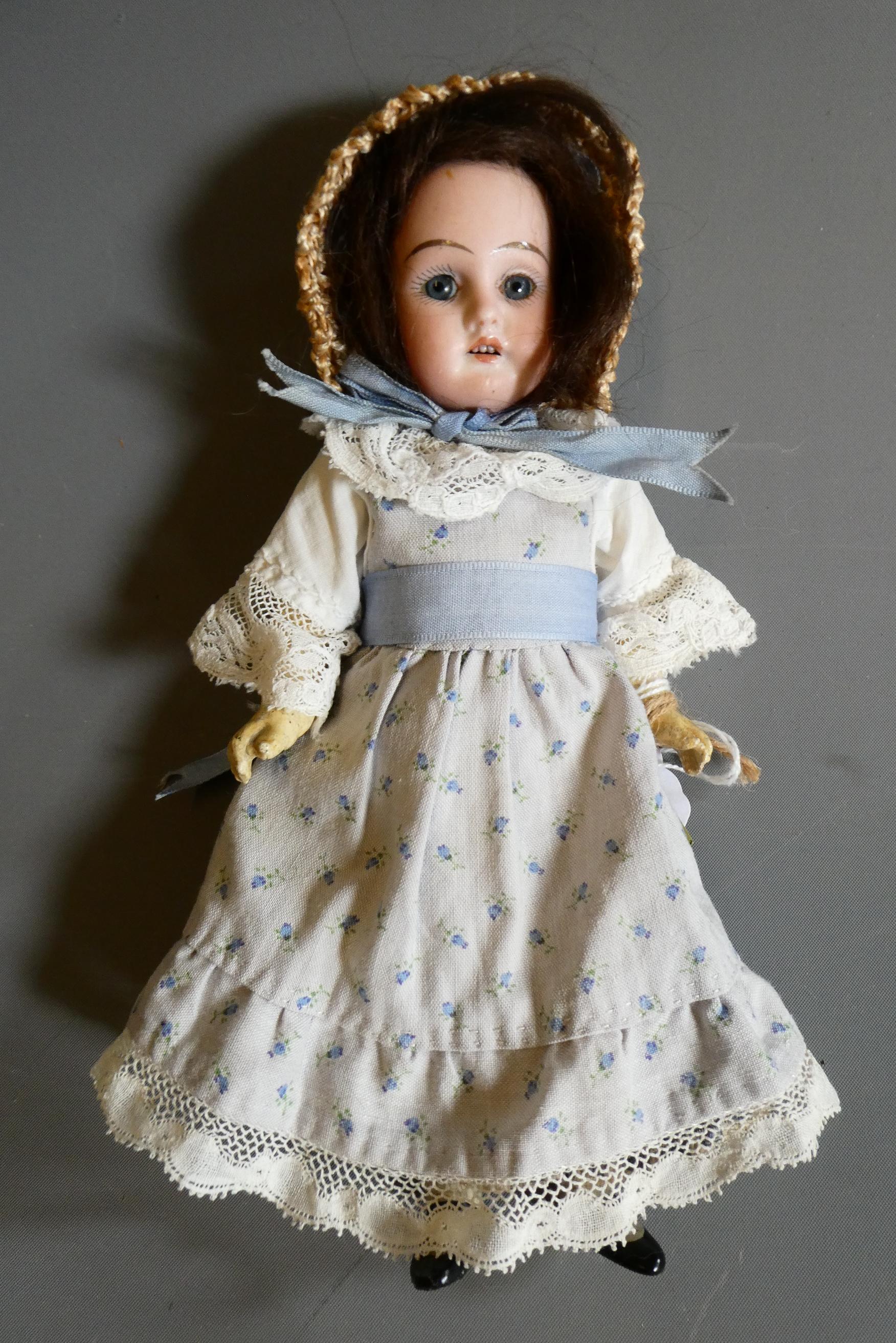 An Armand Marseille bisque socket head doll Image