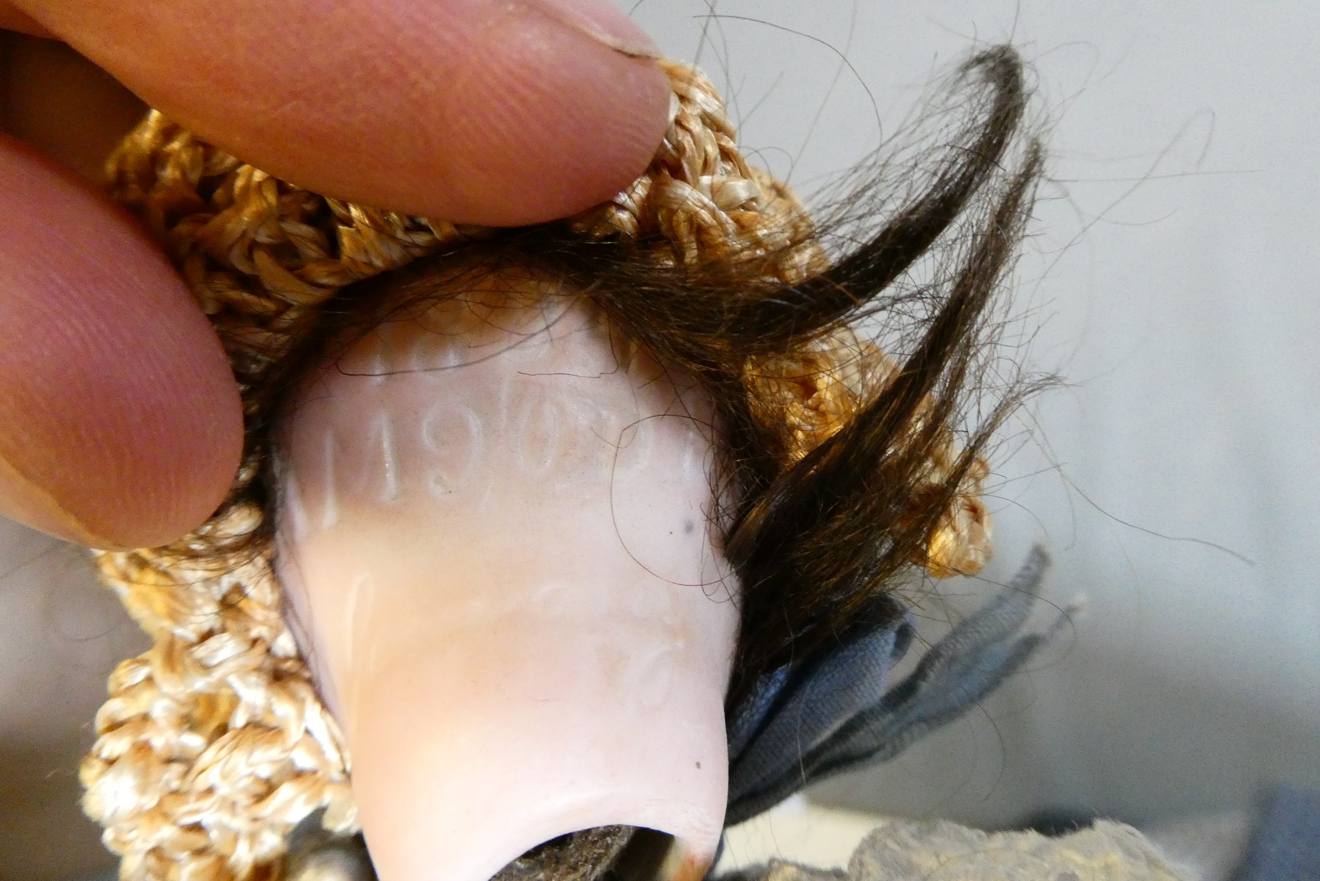 An Armand Marseille bisque socket head doll Image