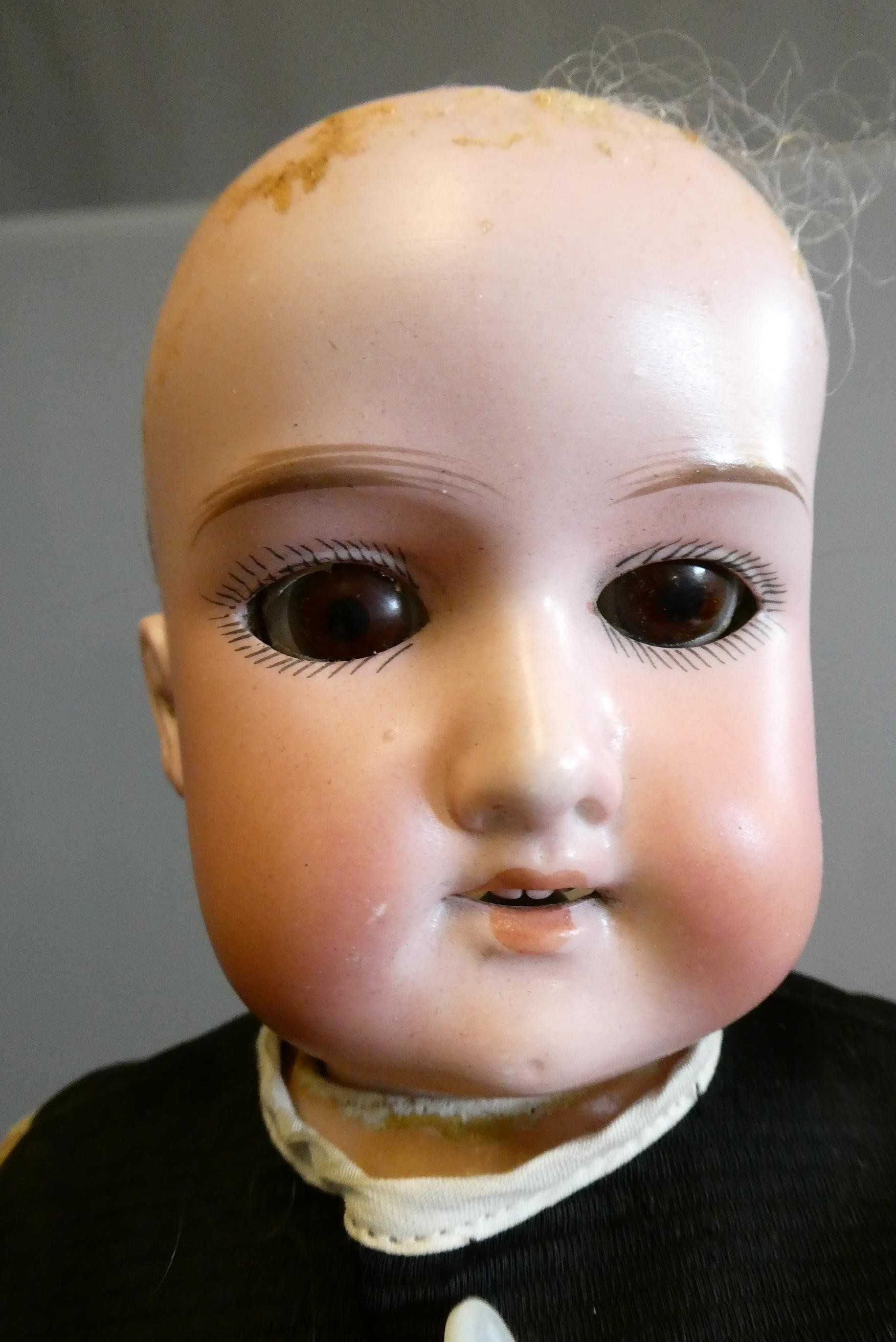 Two Armand Marseille bisque socket head dolls Image