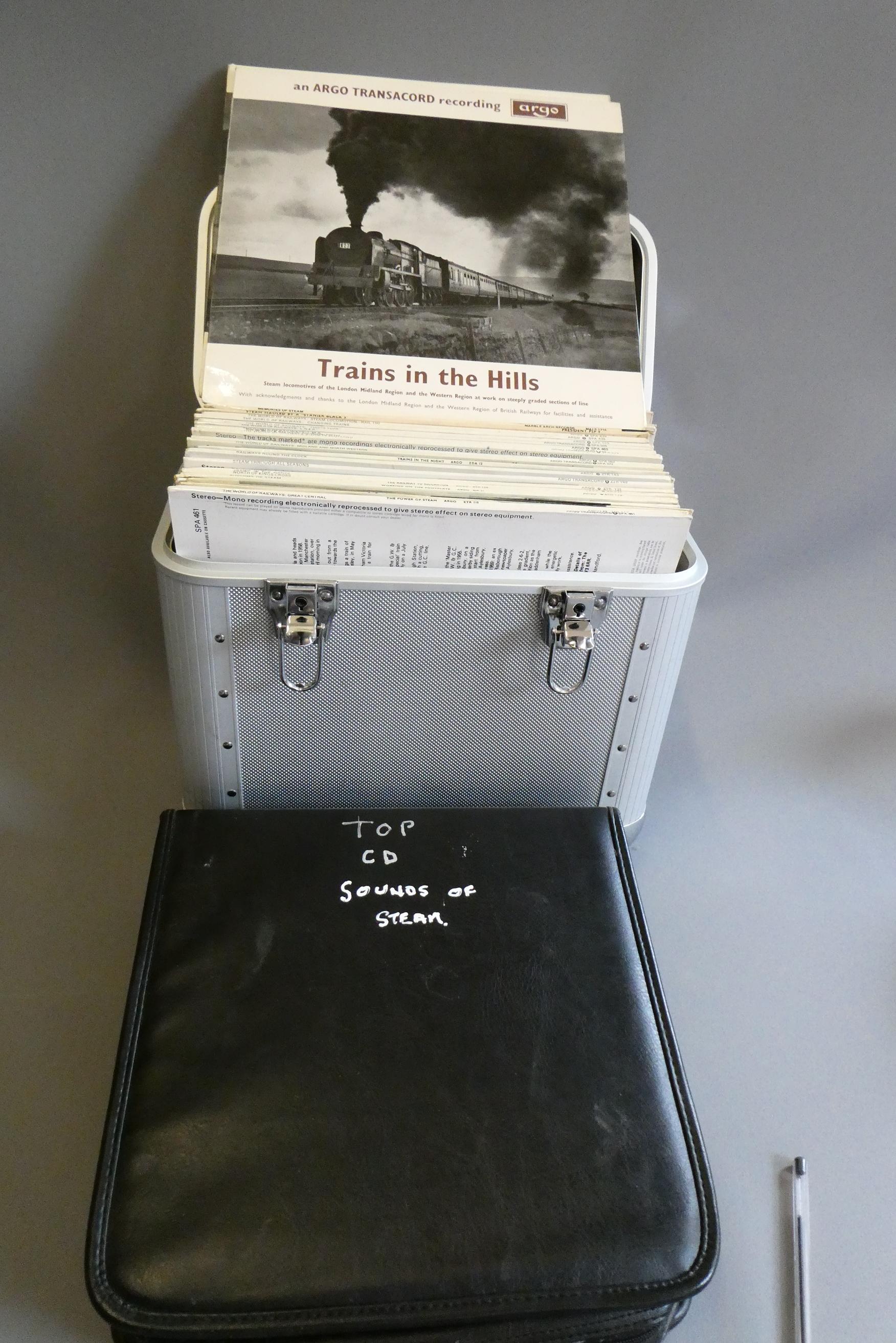 Argo steam train recordings on vinyl and CDs along with a quantity of railway photographs on back Image