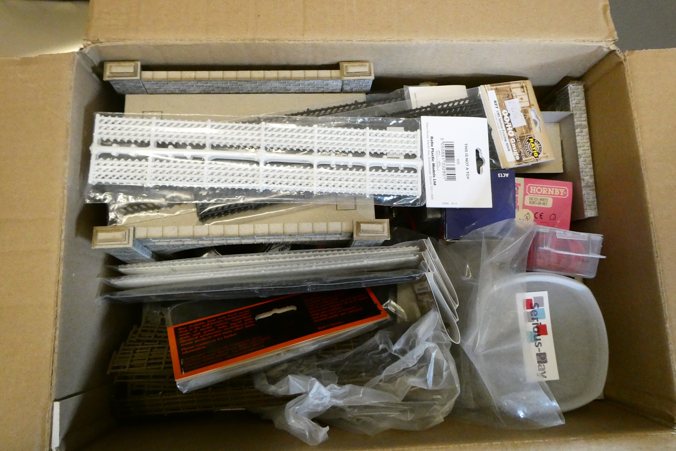 Peco track and electro frog points, most items boxed and unused, and a small quantity of trackside Image