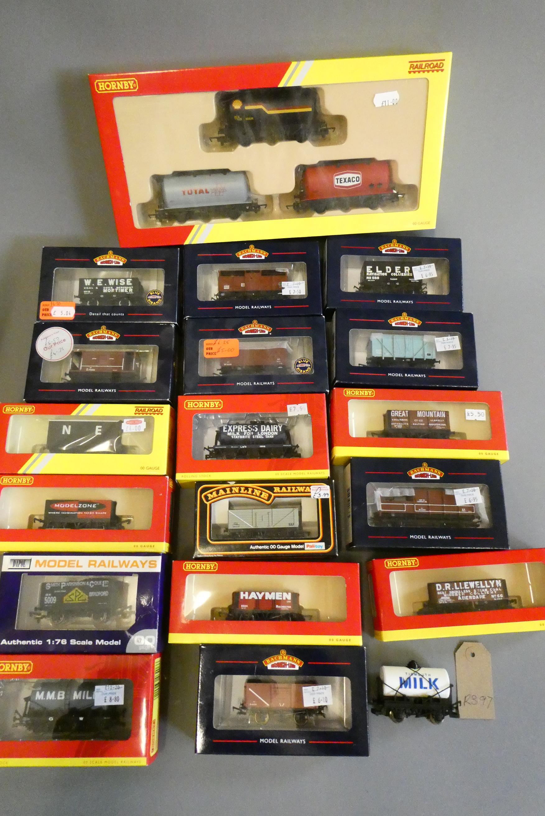 Eighteen goods wagons by Hornby, Bachmann and others, all items boxed, good to excellent (Est. plus Image