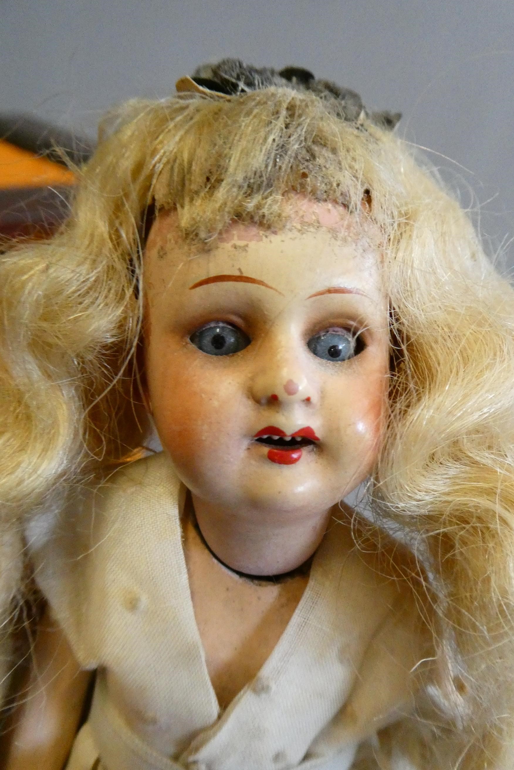 A mahogany half tester doll's bed Image