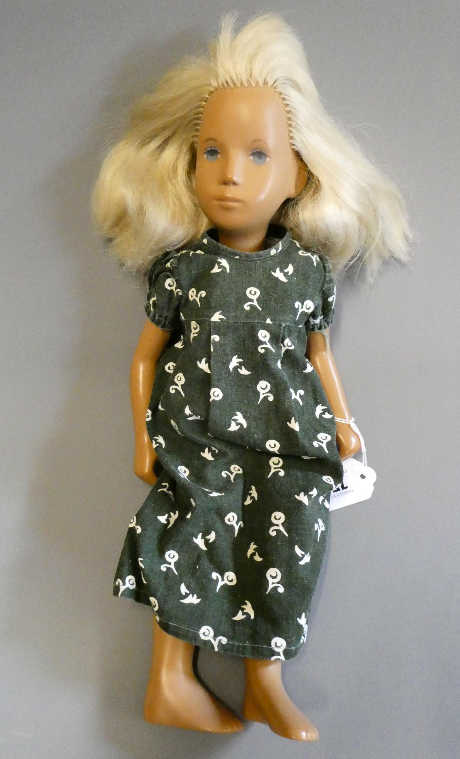 Sasha girl doll, with blond hair and green dress, 15 3/4" long (Est. plus 24% premium inc. VAT) Image