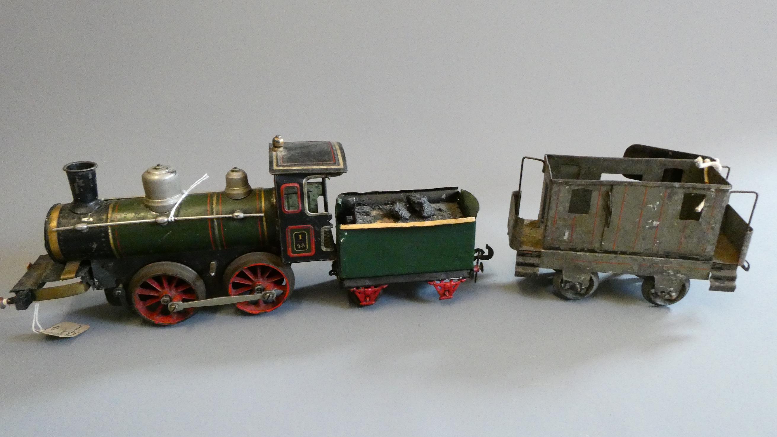Bing gauge 1 clockwork locomotive and tender, some damage and parts missing, fair to poor (Est. plus Image