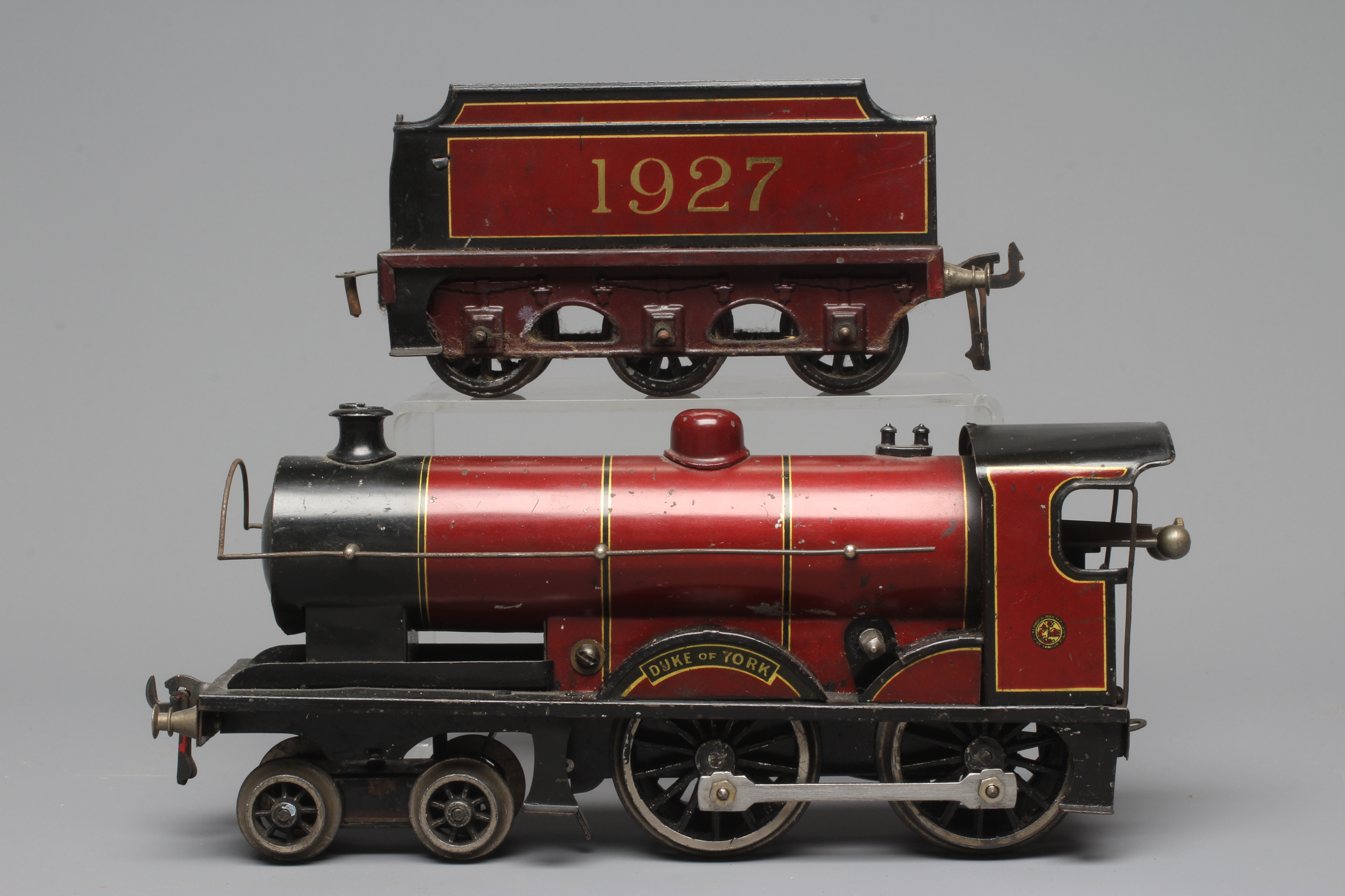 Basset-Lowke Clockwork Duke of York locomotive and tender. Some minor paint scratches, fair to good Image