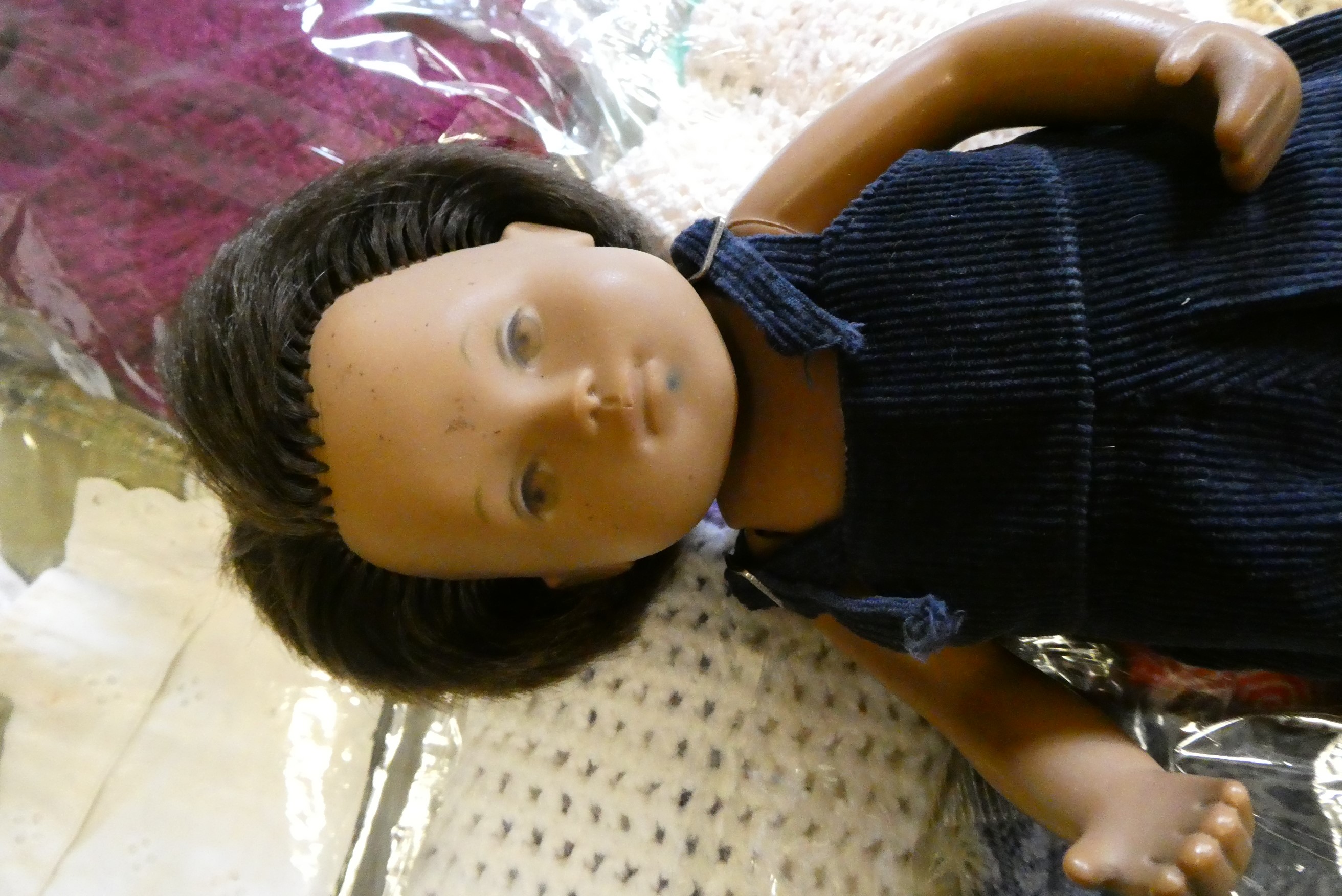 Sasha doll, with a bag of original 1970s Sasha clothing and other clothing to fit Sasha Image