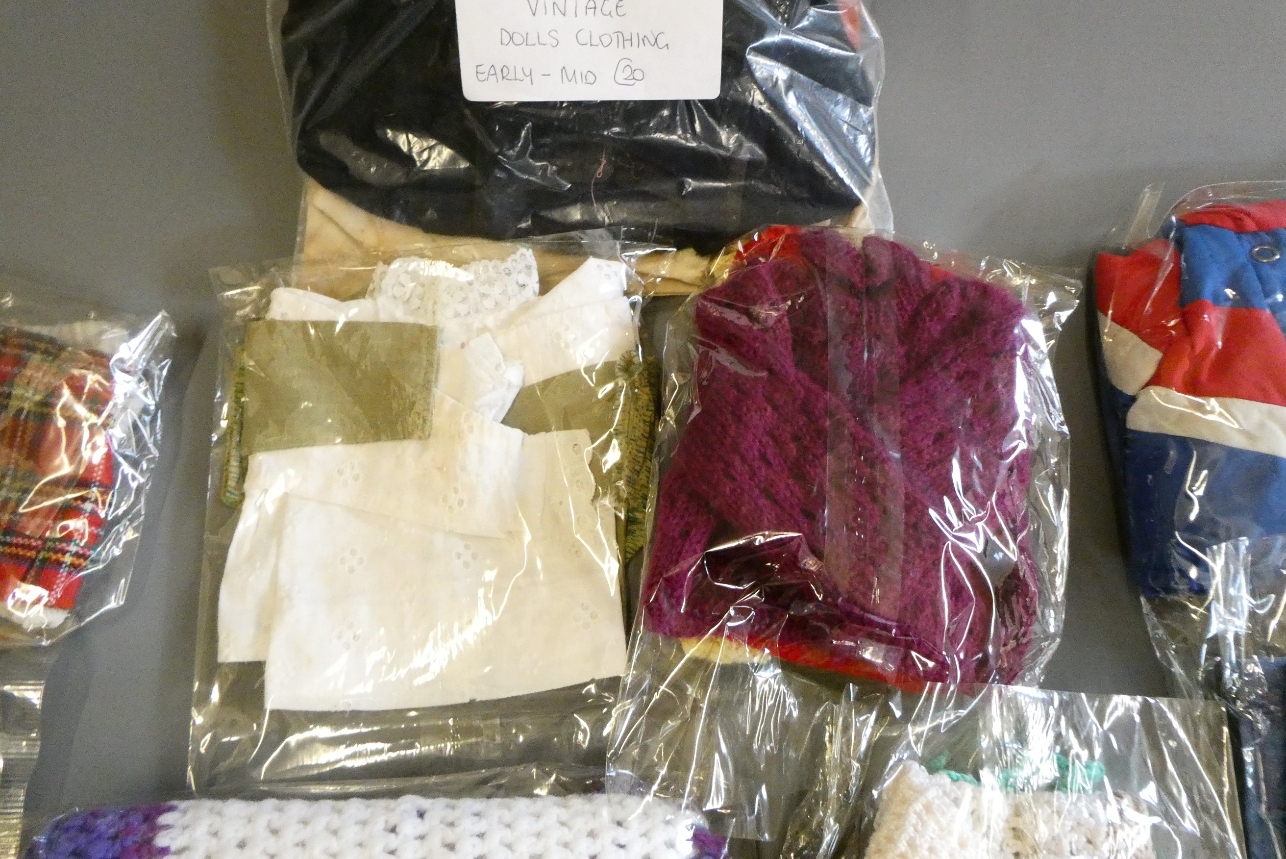 Sasha doll, with a bag of original 1970s Sasha clothing and other clothing to fit Sasha Image