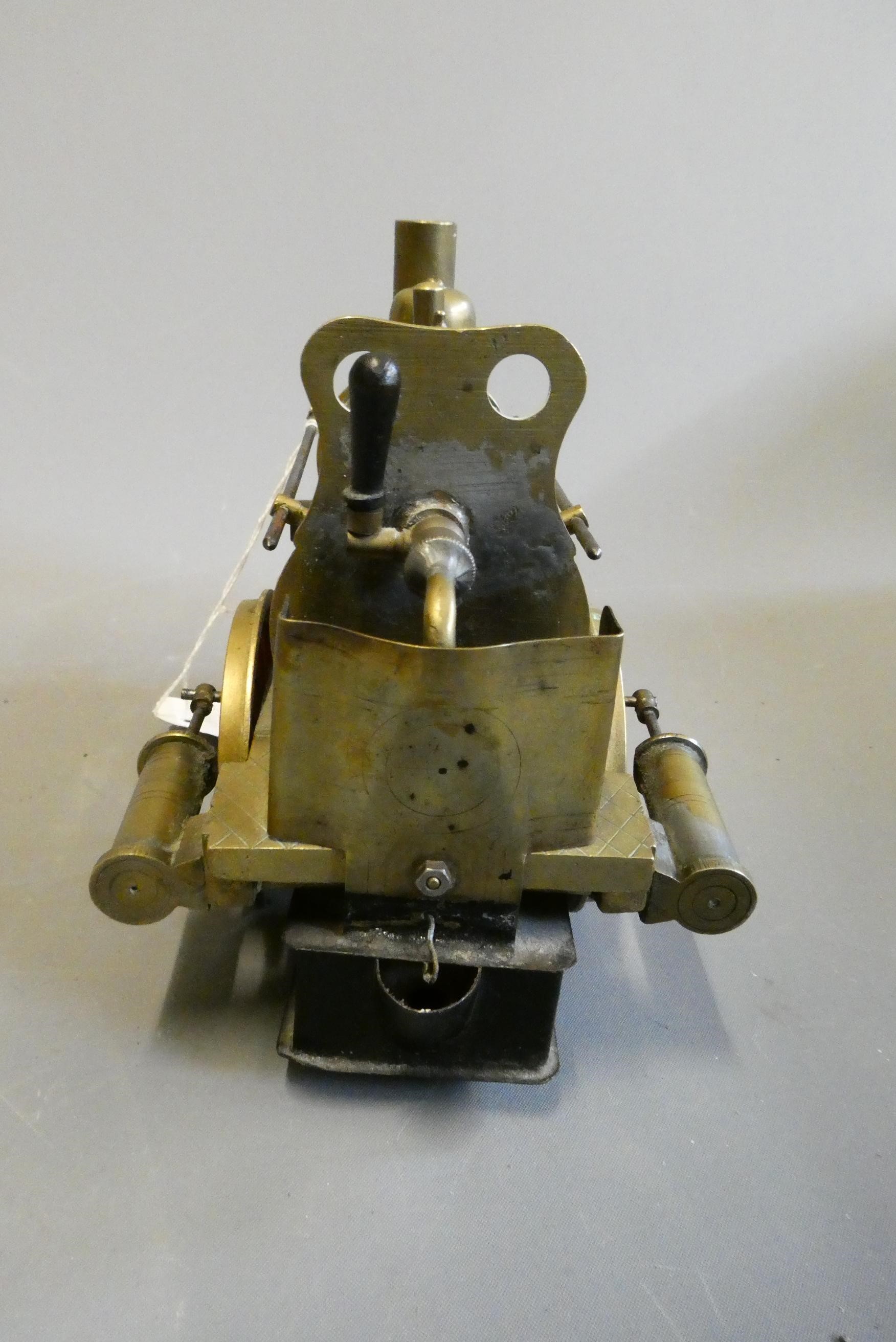 Brass Dribbler floor locomotive with twin oscillating cylinders, safety valve, whistle drain cock Image