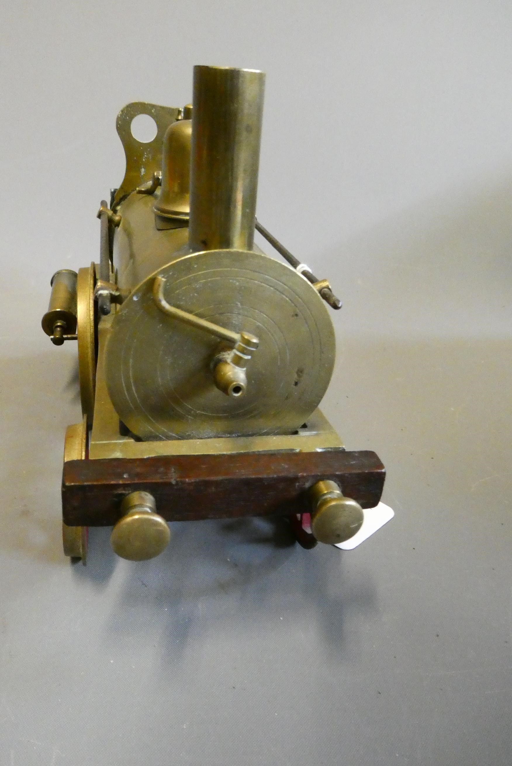 Brass Dribbler floor locomotive with twin oscillating cylinders, safety valve, whistle drain cock Image