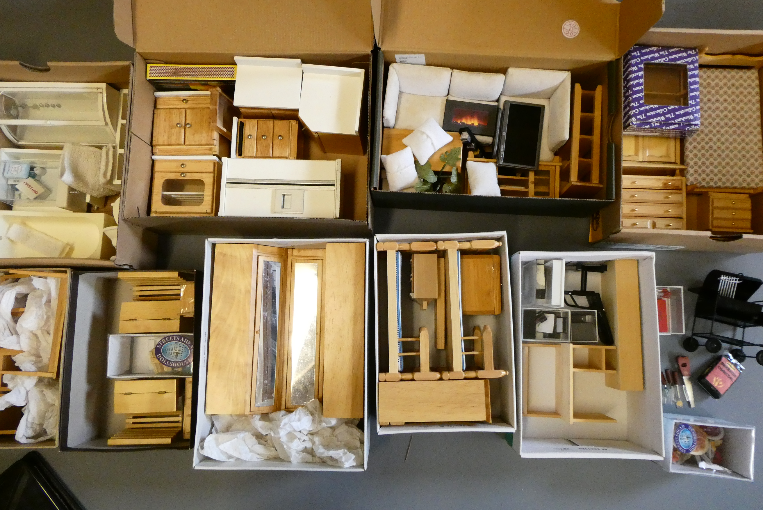 A large quantity of doll's house furniture Image