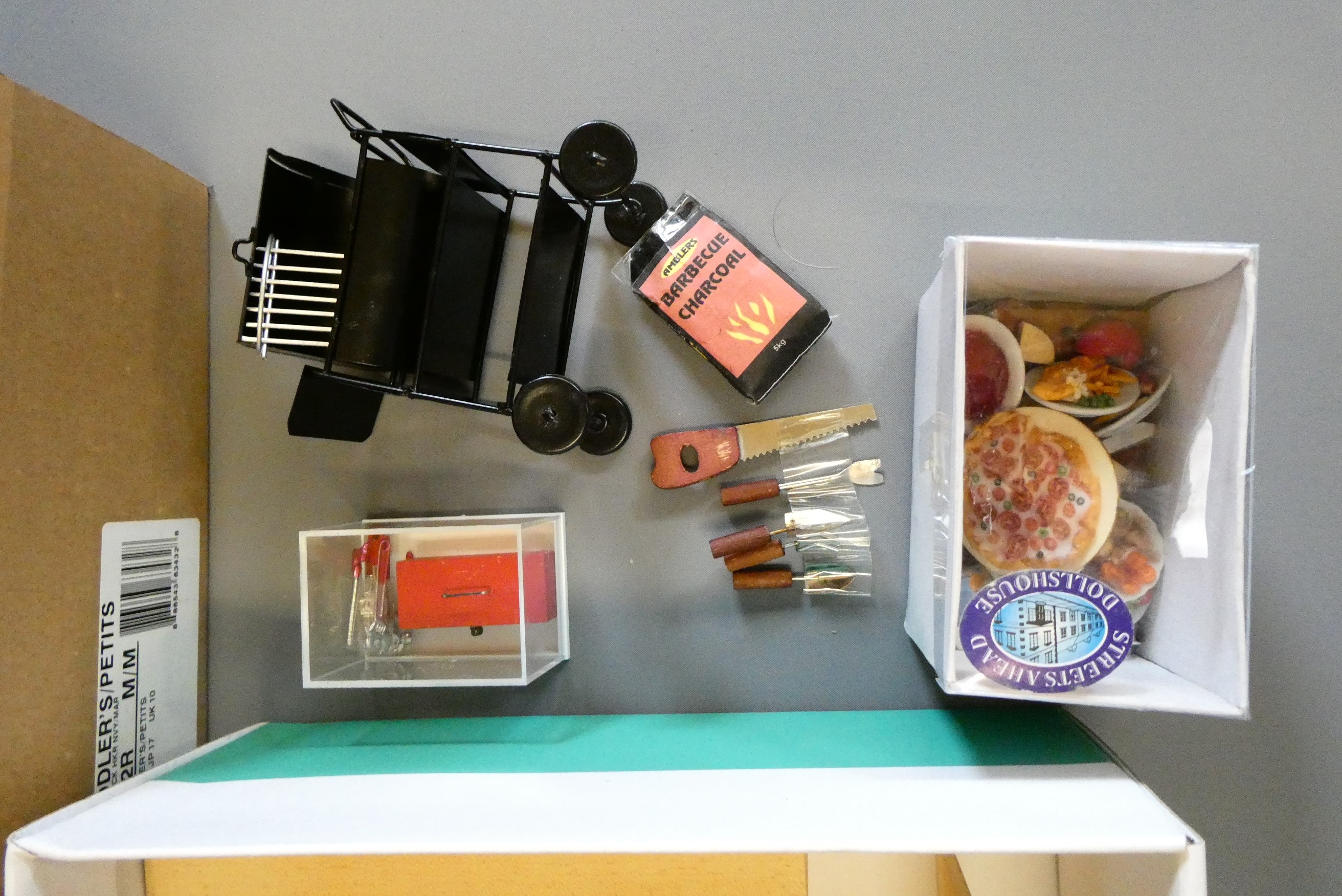 A large quantity of doll's house furniture Image