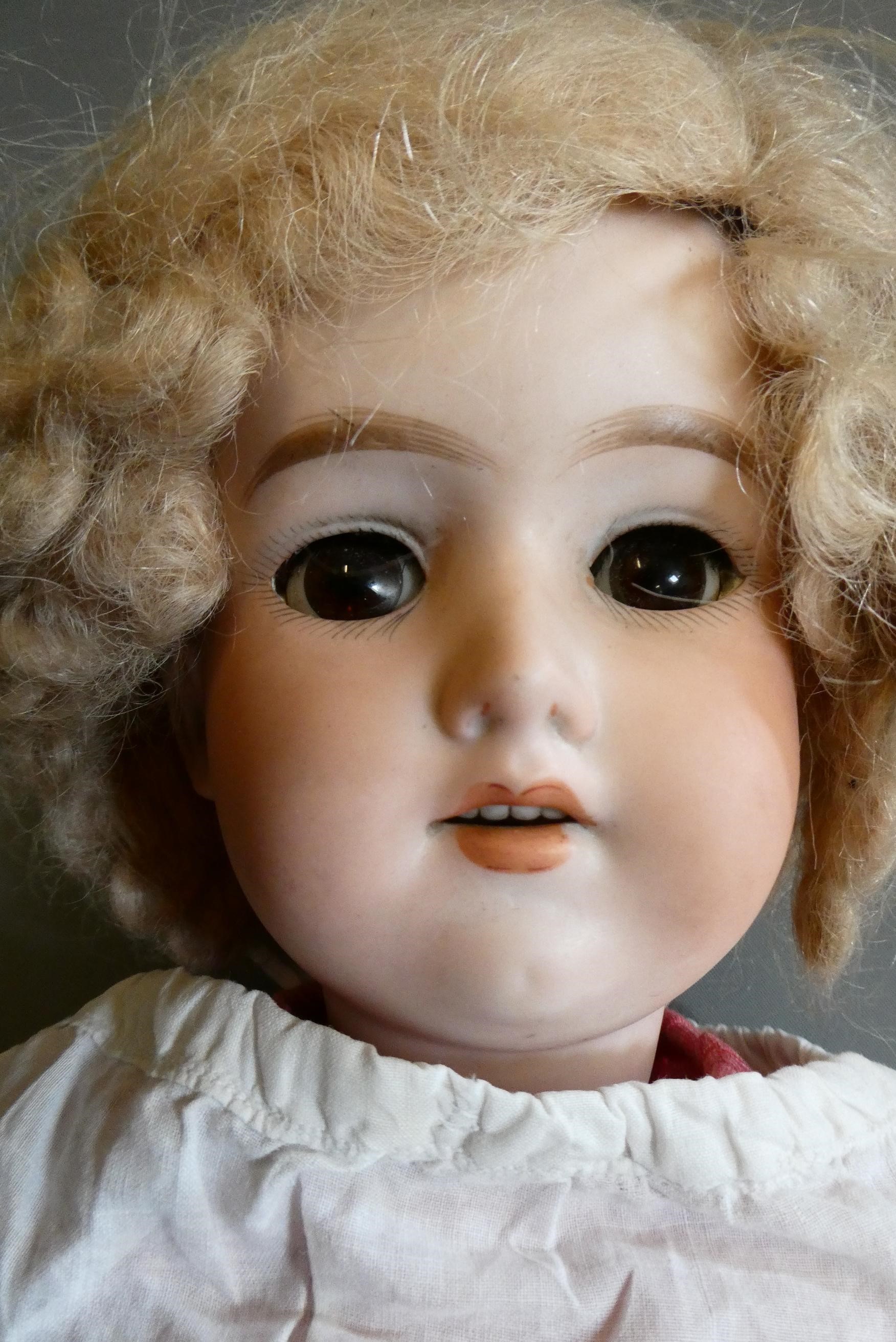 An Armand Marseille bisque socket head doll Image