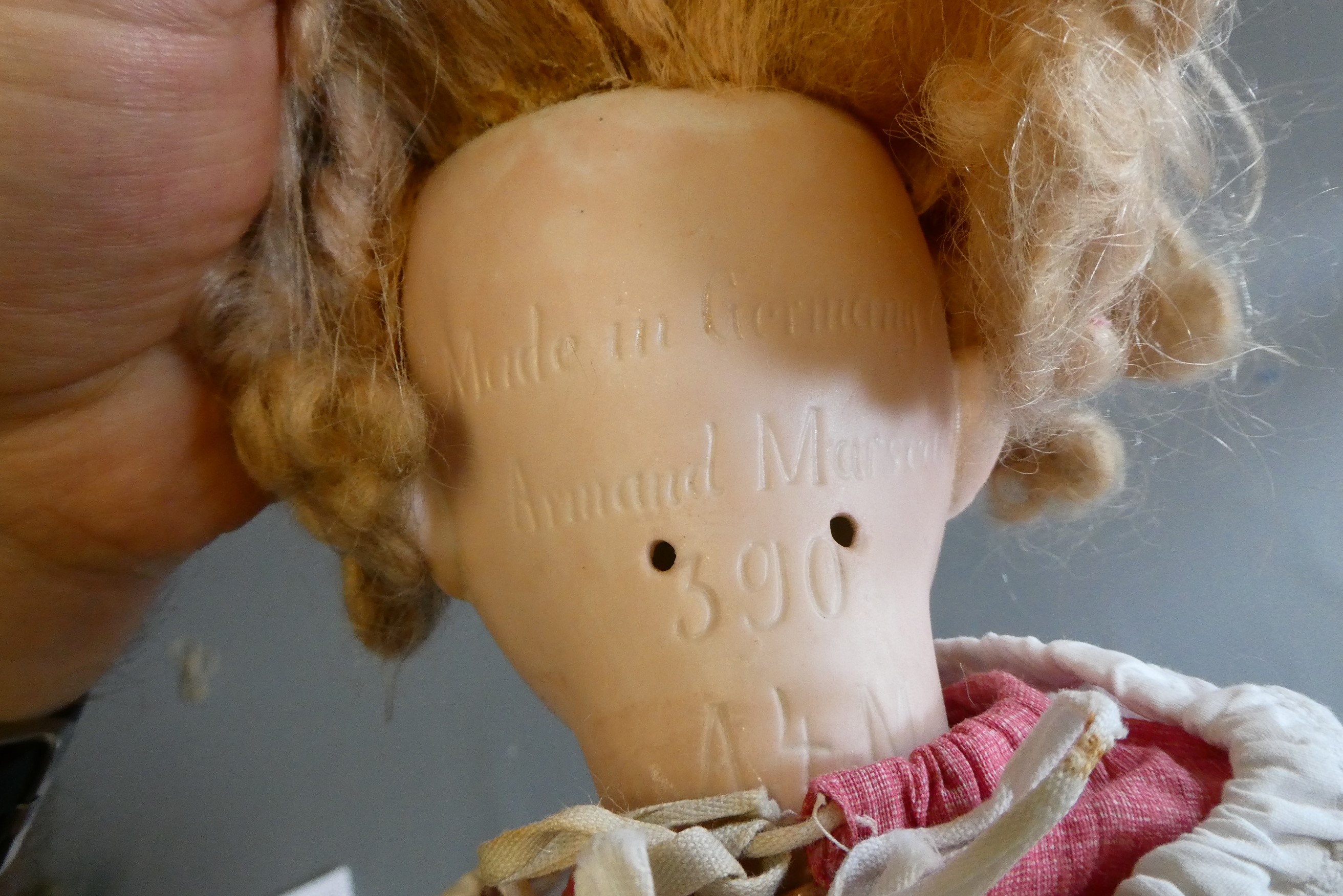 An Armand Marseille bisque socket head doll Image