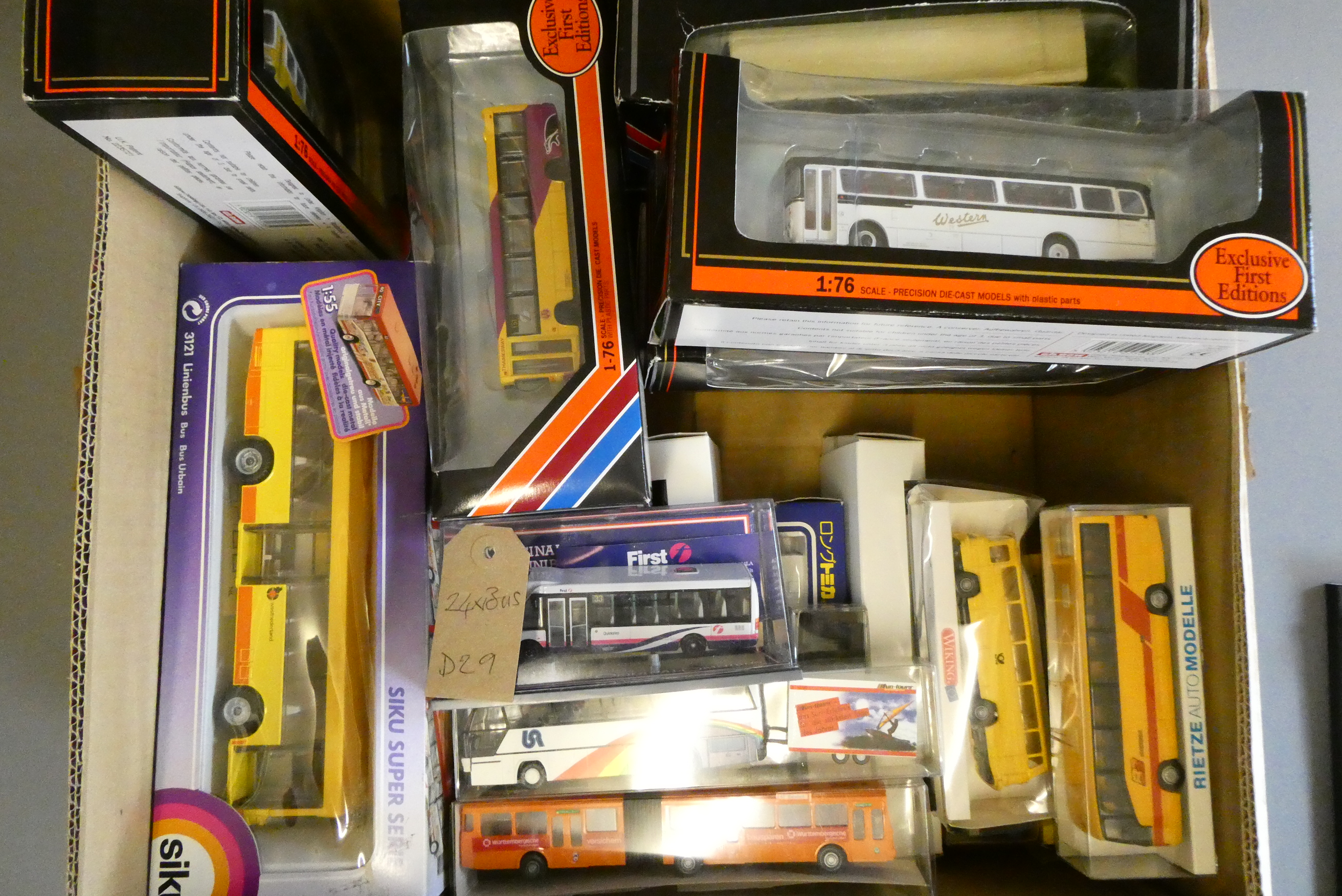 Twenty four diecast and plastic models of modern bus and coach types, all items boxed, good to Image