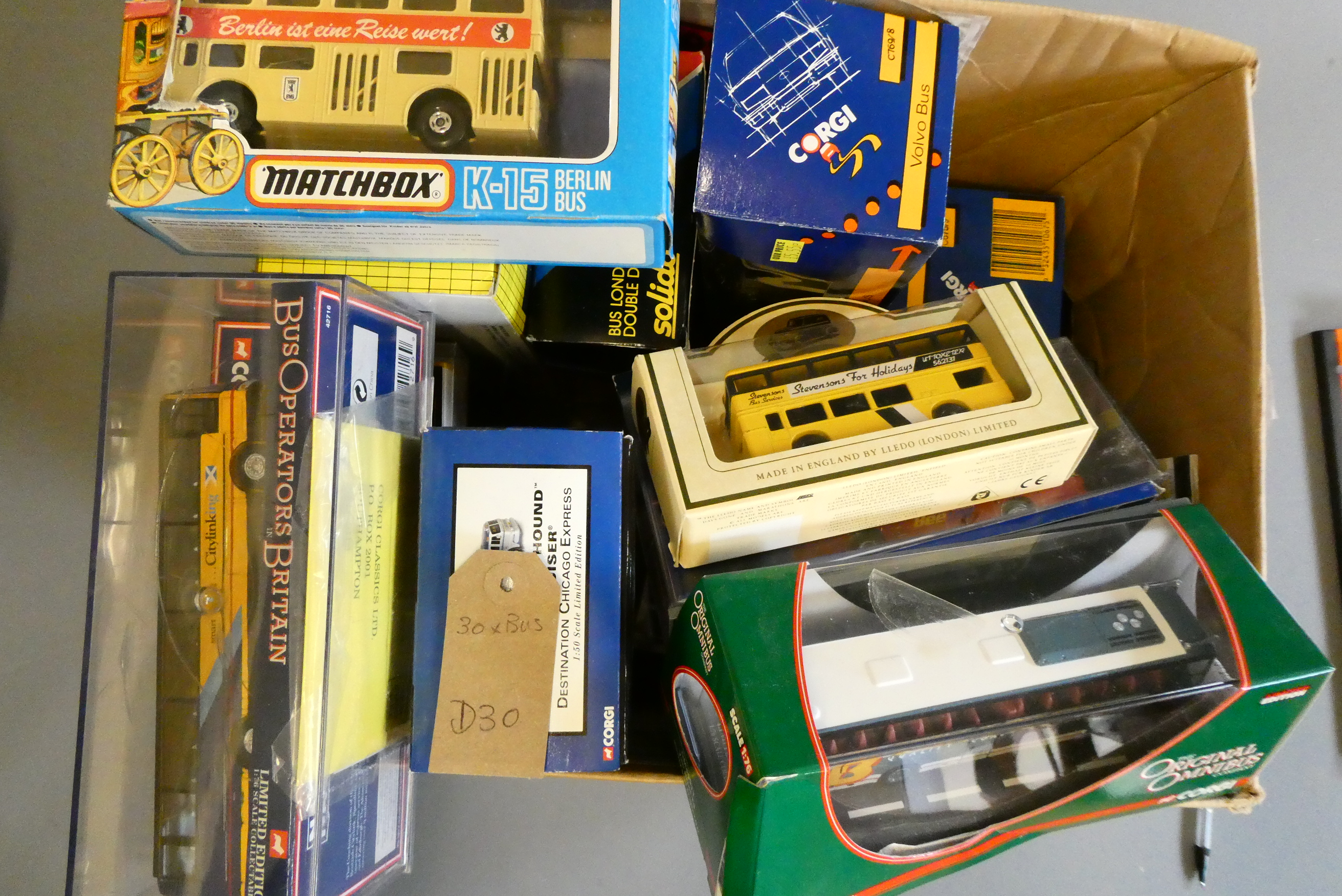 Thirty diecast and plastic models of modern bus and coach types, all items boxed, good to excellent Image