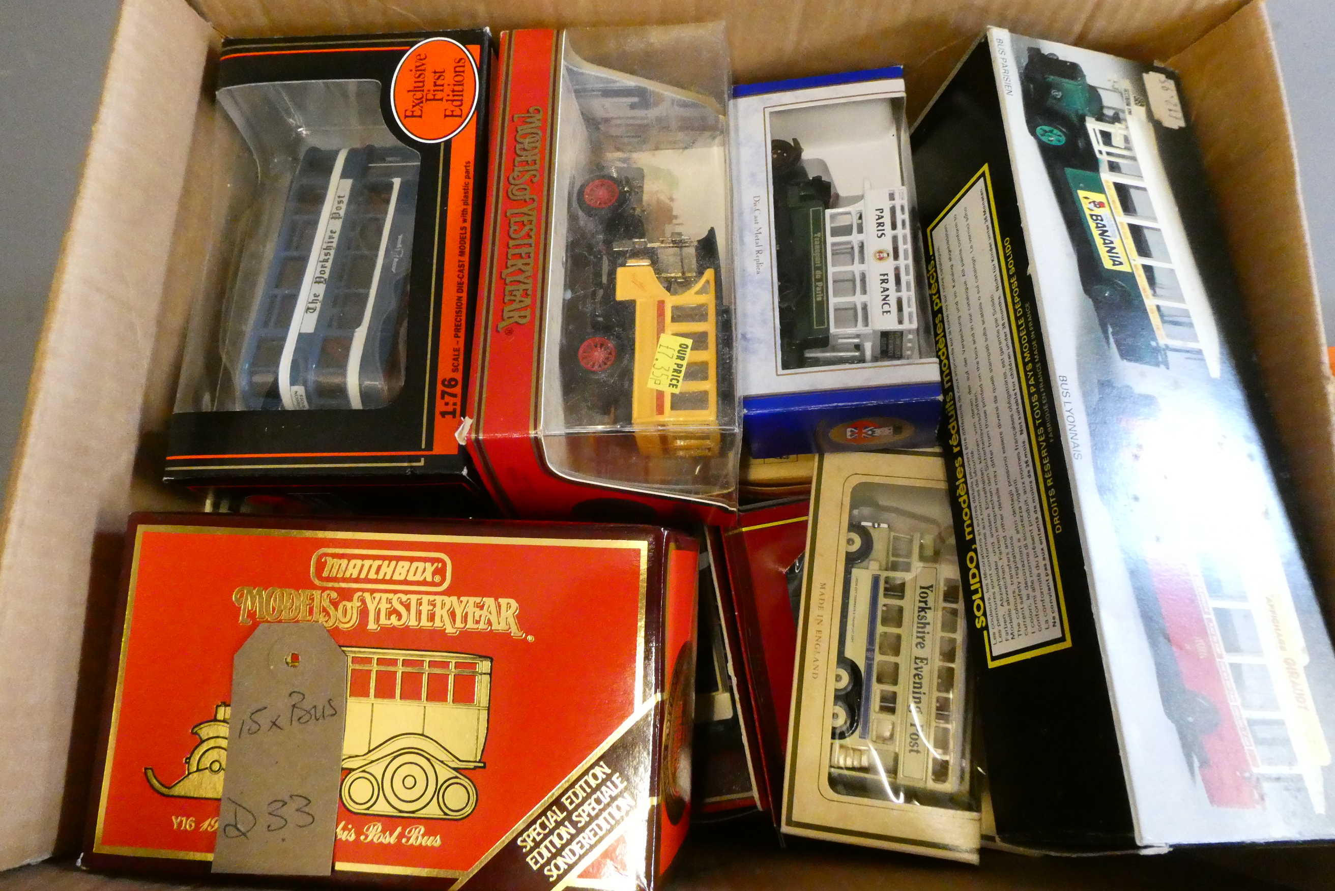 Fourteen diecast and plastic models of vintage bus and coach types, all items boxed, good to Image