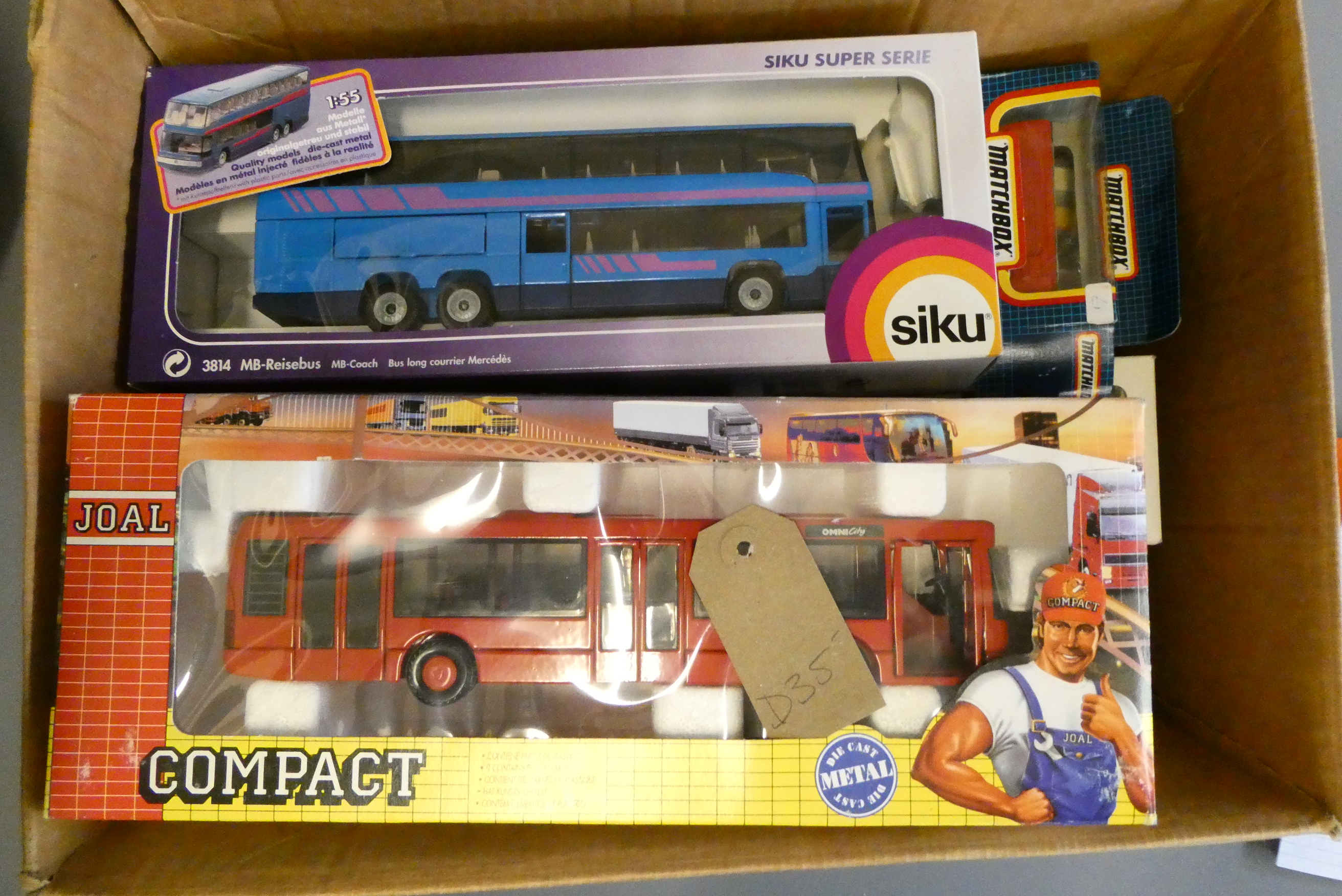 Thirty diecast and plastic models of modern bus and coach types, all items boxed, good to excellent Image