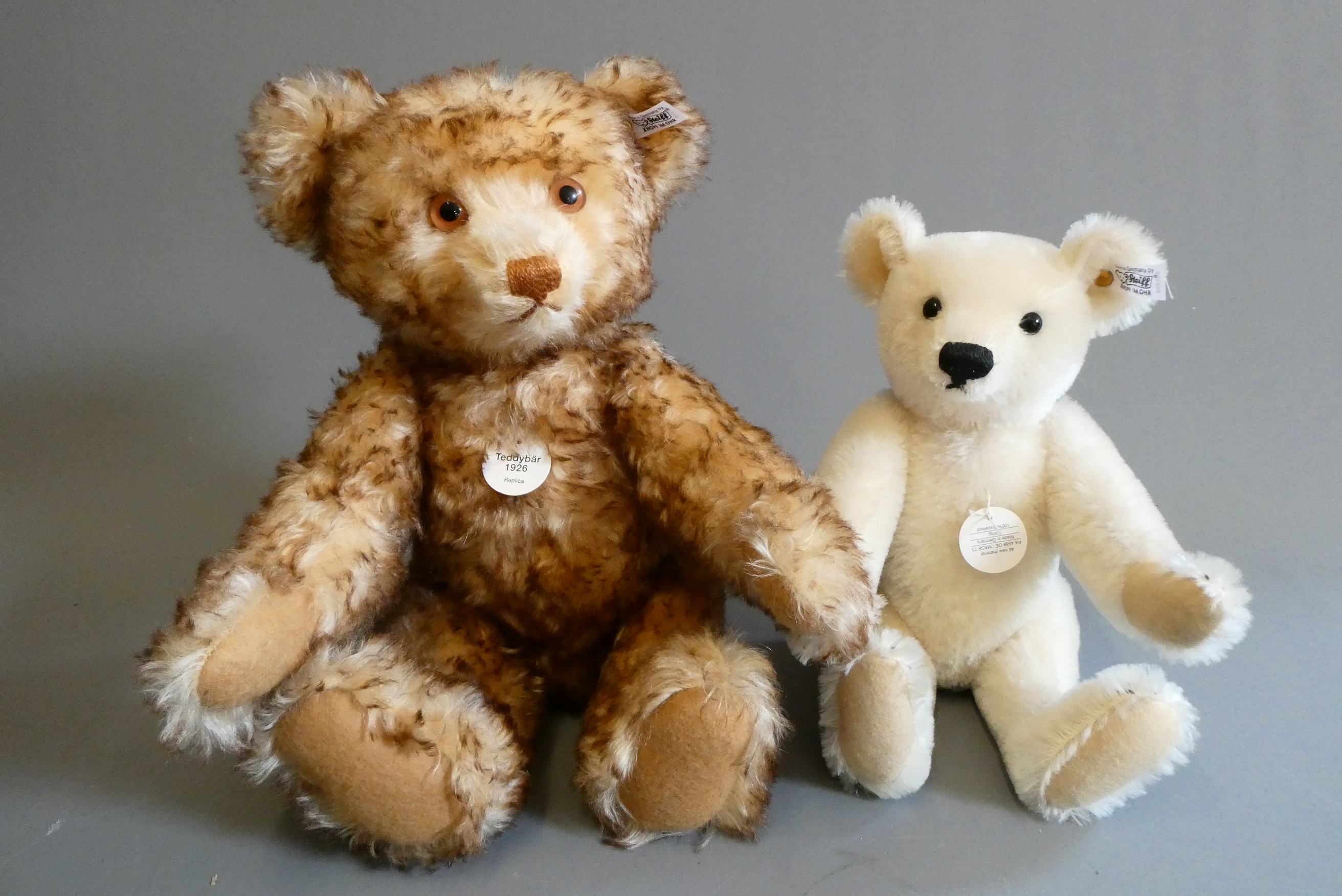 Two Steiff collectors bears, comprising a 1926 replica teddy bear, 16 1/2" long, and a white 1922 Image