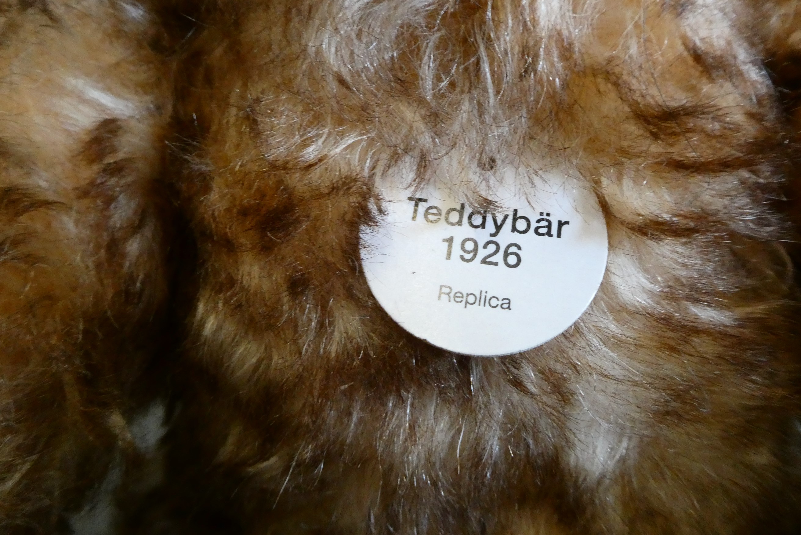 Two Steiff collectors bears, comprising a 1926 replica teddy bear, 16 1/2" long, and a white 1922 Image