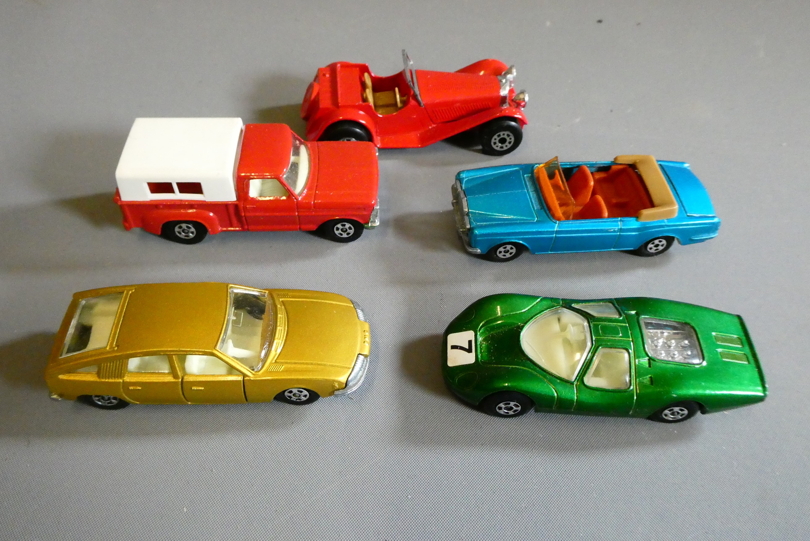 Five Matchbox Superfast cars comprising No6 Ford pickup, No45 Ford Group 6, No47 Jaguar SS100, No56 Image