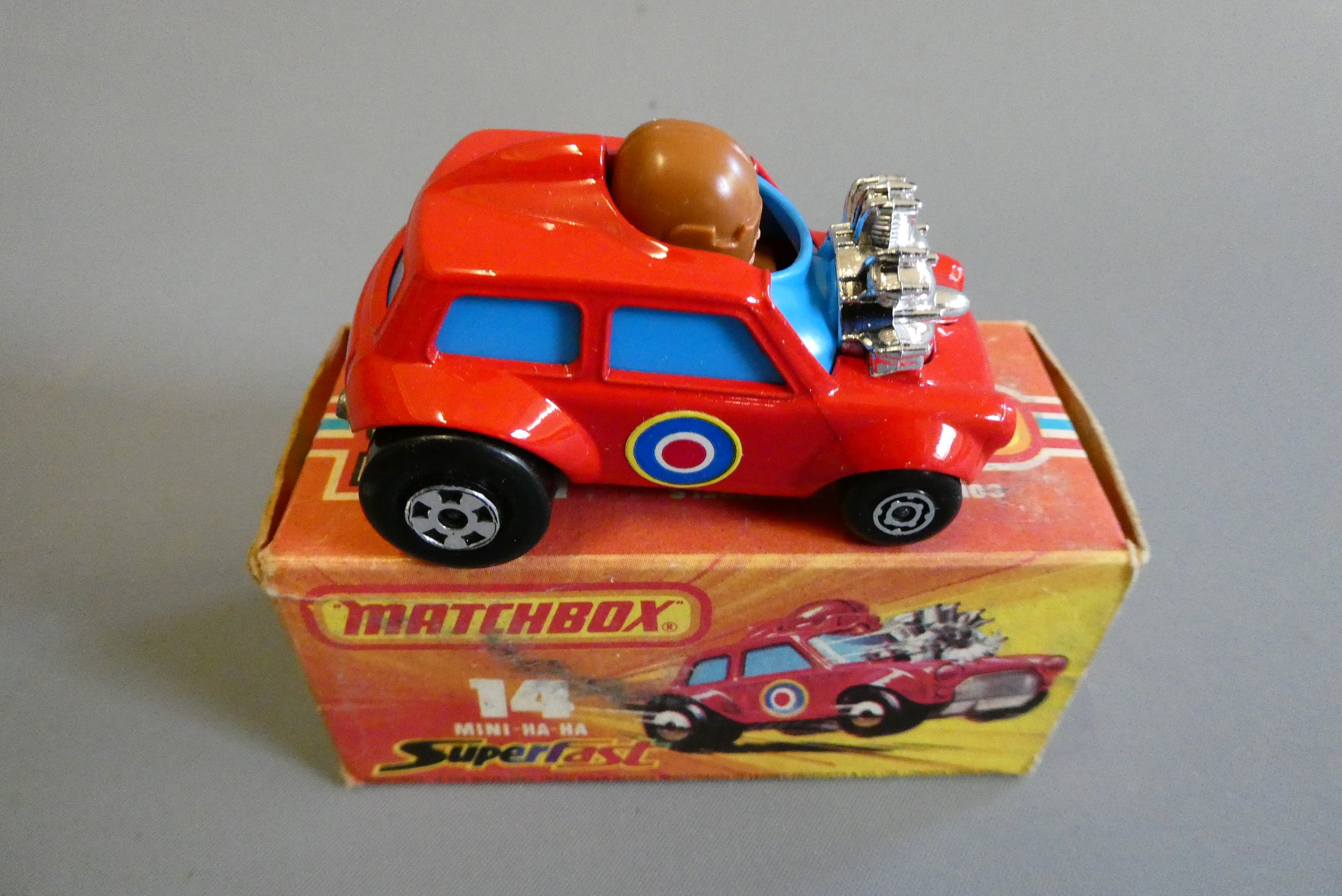 Four Matchbox Superfast cars comprising No14 Mini Ha Ha, No8 De Tomaso Pantera, No 61 Blue Shark and Image