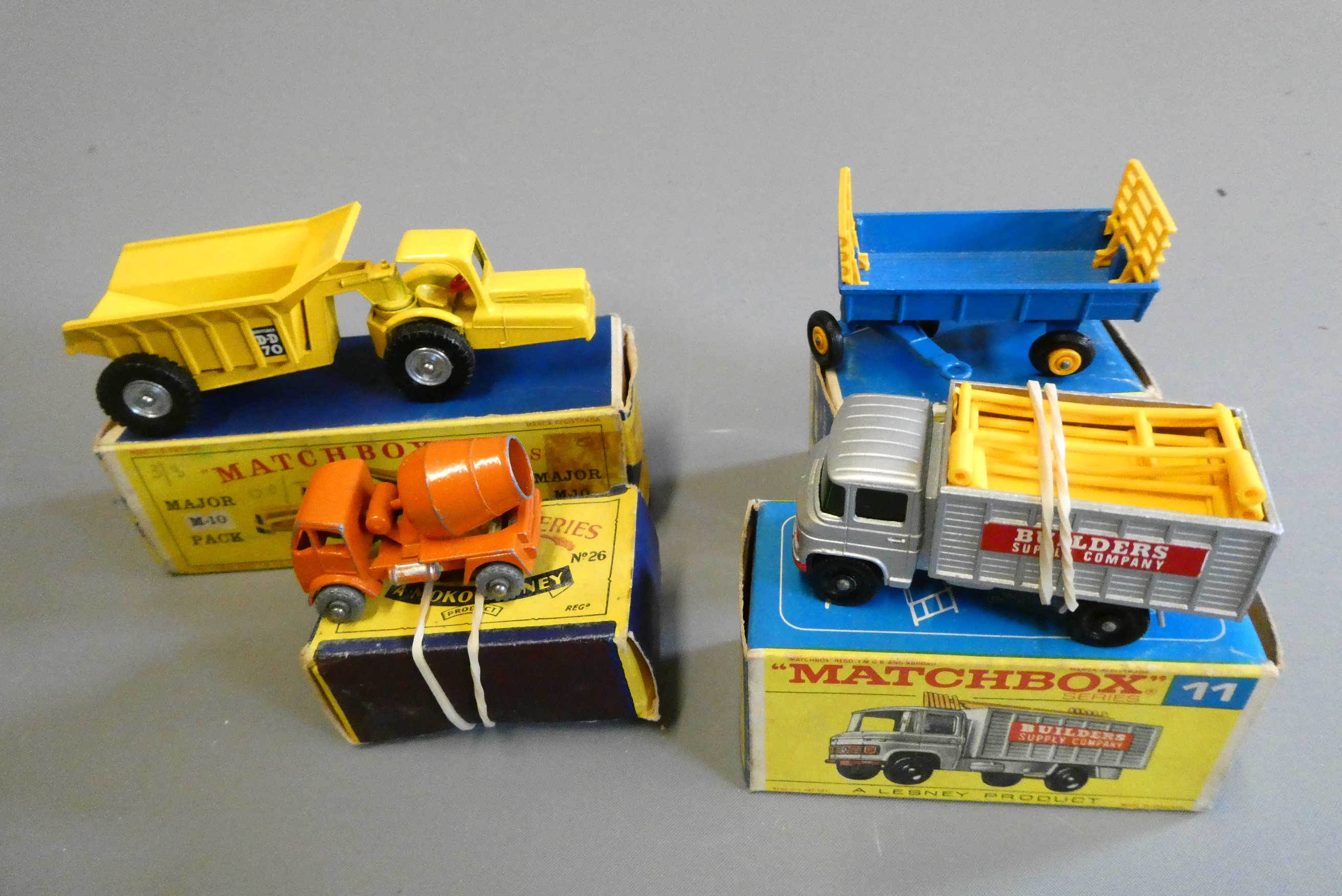 Matchbox No11 Scaffolding Truck, No26 Cement Mixer, No40 Hay Trailer, M-10 Whitlock Dumper and 40th Image