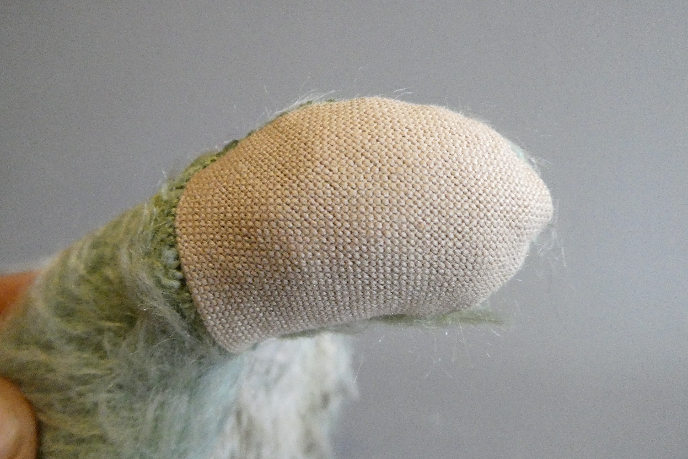 A rare blue Hugmee Chiltern teddy bear "bluey", with amber glass eyes, sewn nose and fabric pads, Image