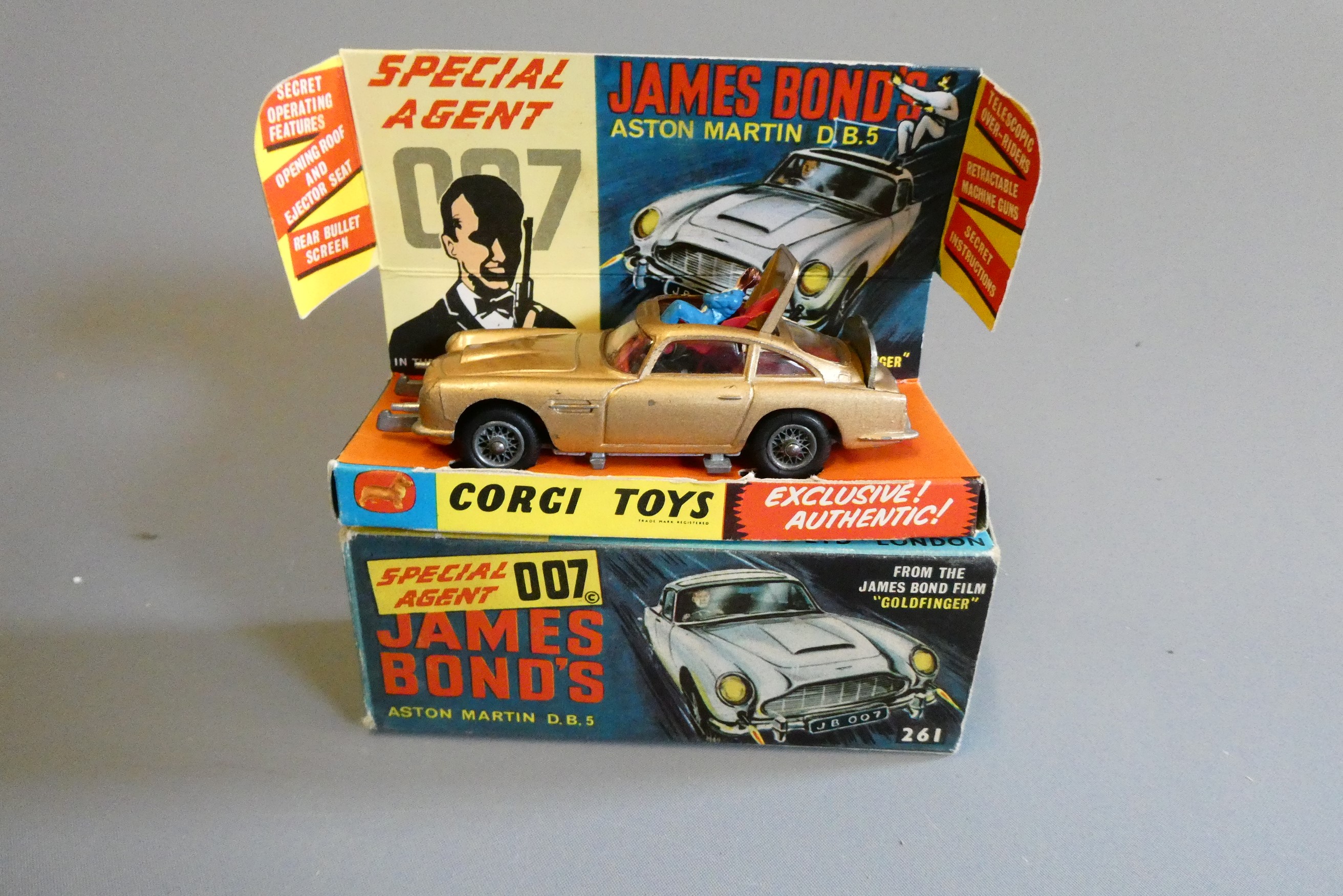 Corgi 261 James Bond Aston Martin DB5, first edition in gold with instructions and spare passenger. Image