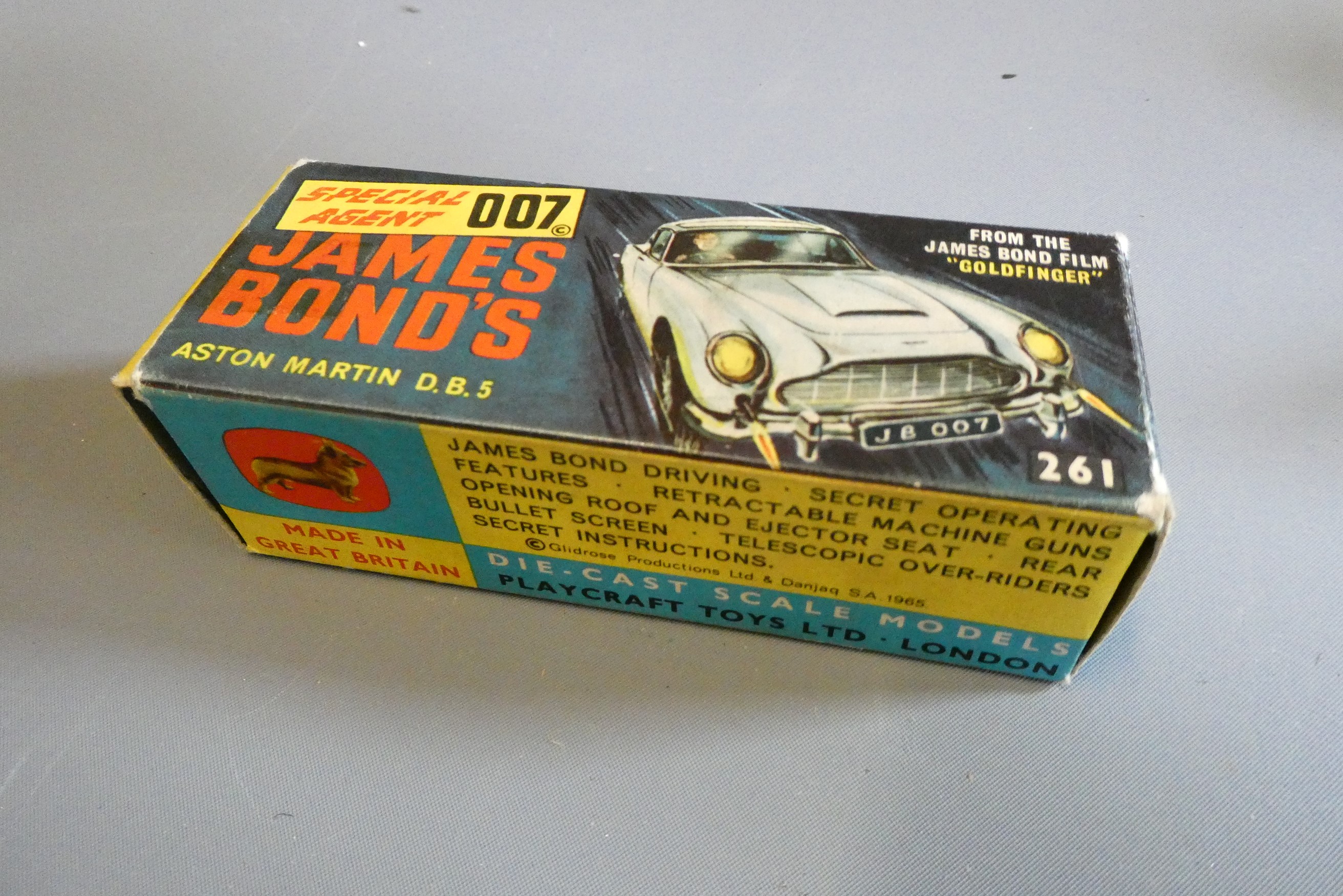 Corgi 261 James Bond Aston Martin DB5, first edition in gold with instructions and spare passenger. Image
